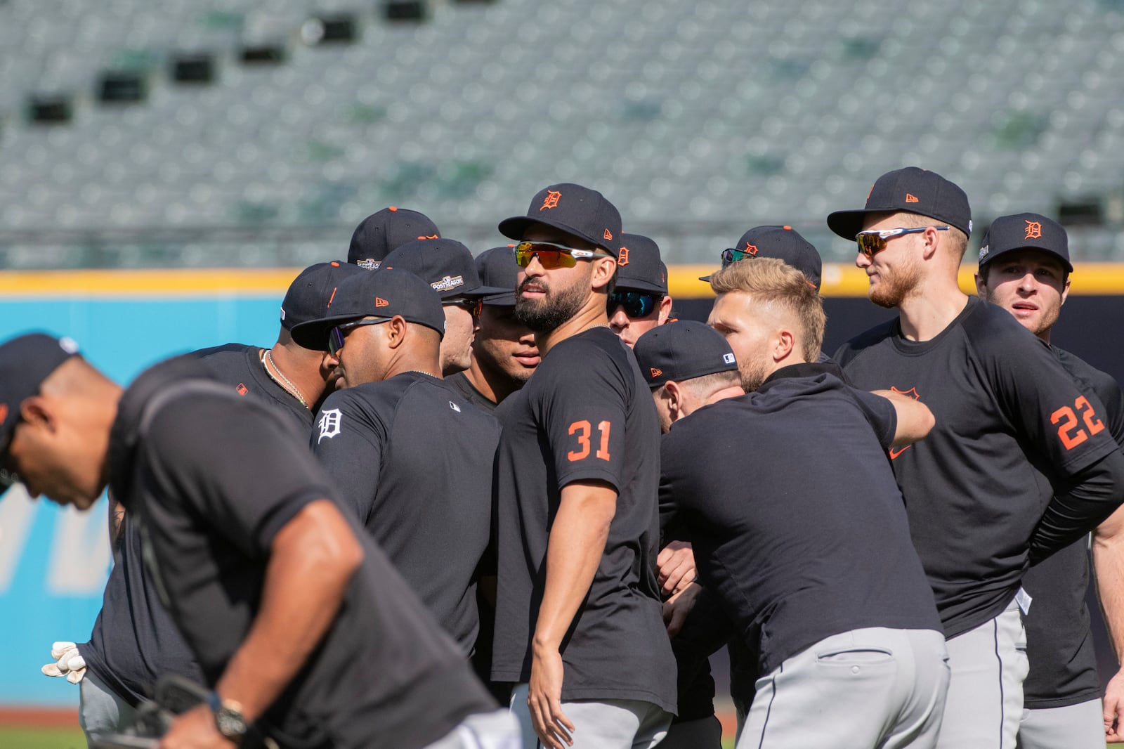 Detroit Tigers' Riley Greene (31), Parker Meadows (22) and their teammates huddle before a baseball workout in Cleveland, Friday, Oct. 11, 2024, in preparation for Saturday's Game 5 of the American League Division Series against the Cleveland Guardians. (AP Photo/Phil Long)