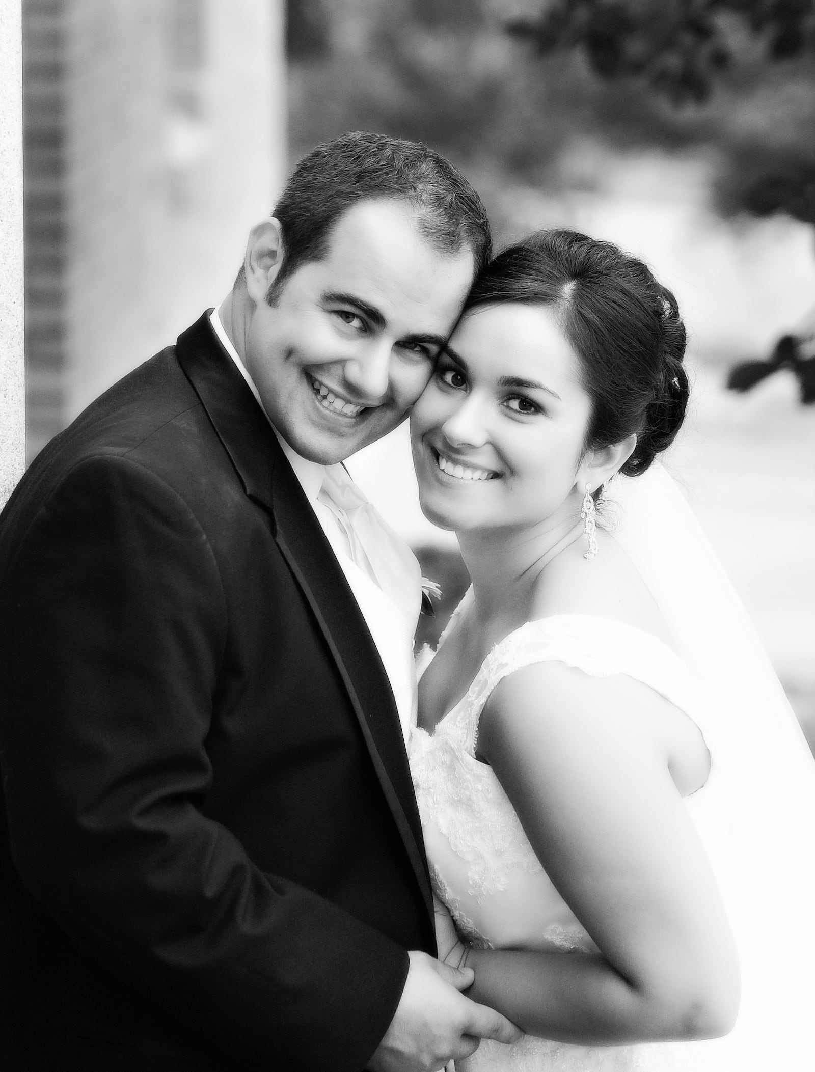 Ziehler (Left) and wife Dessine on their wedding day in September of 2009.