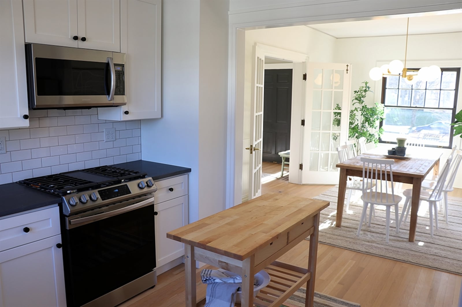 The kitchen has room for an additional moveable counter or breakfast space.