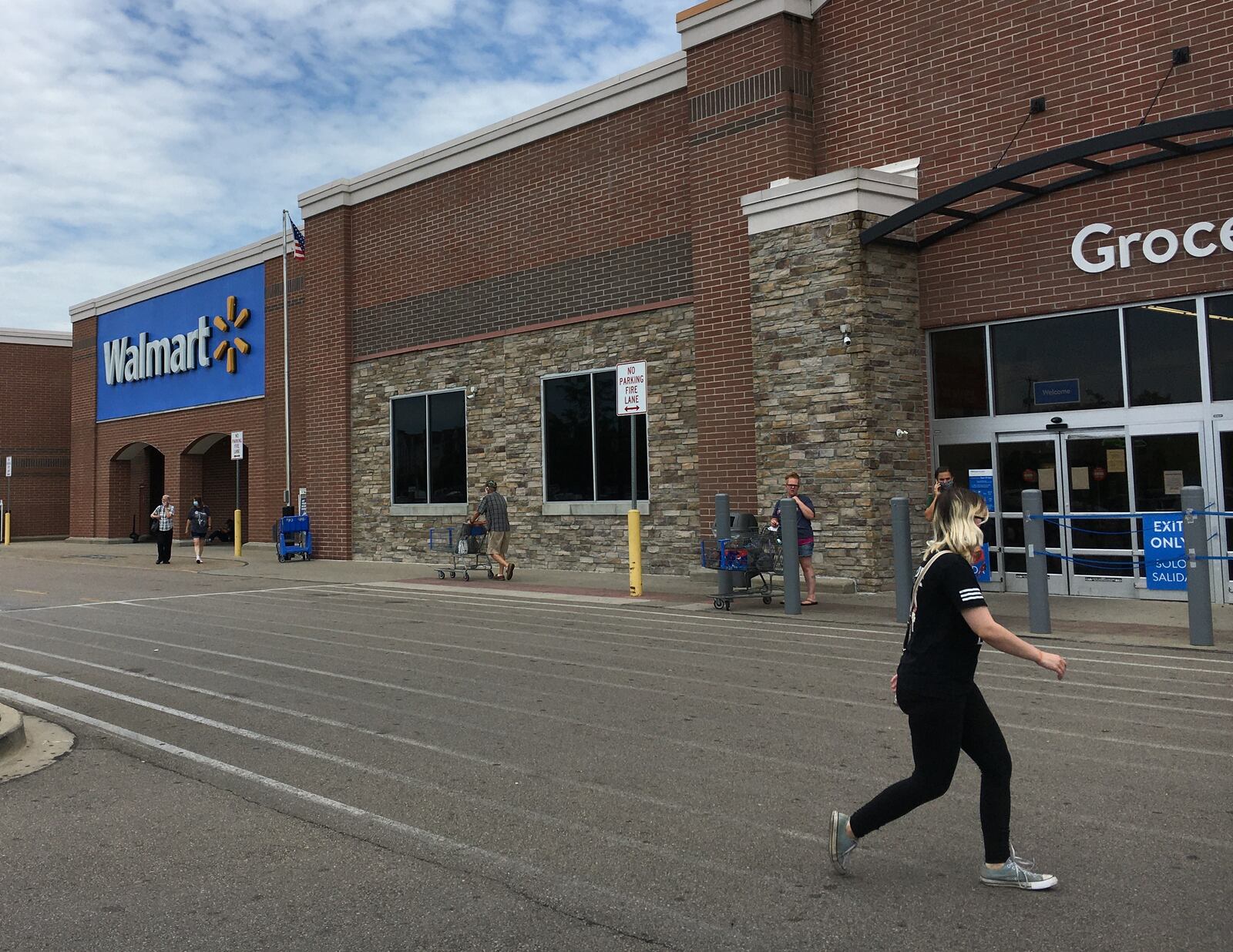 Walmart's new mask policy when into effect on Monday. Shoppers are required to wear a mask while in the store. STAFF/BONNIE MEIBERS