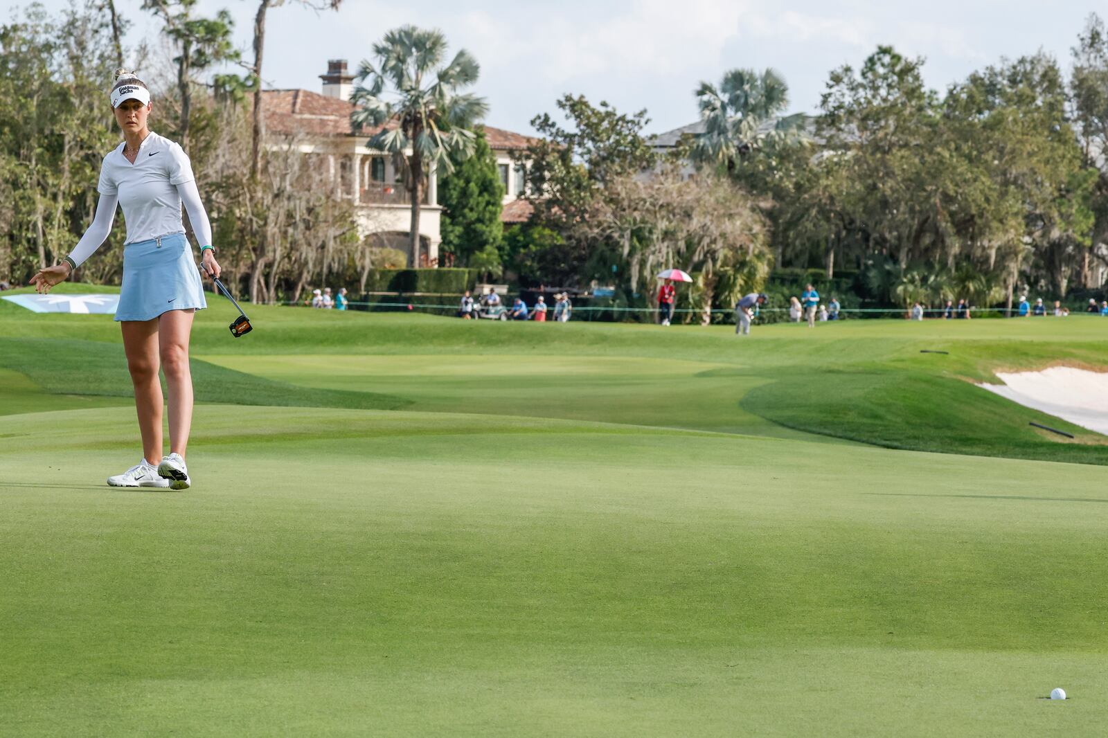 Nelly Korda watches her putt on the 18th green during the final round of the Hilton Grand Vacations Tournament of Champions LPGA golf tournament in Orlando, Fla., Sunday, Feb. 2, 2025. (AP Photo/Kevin Kolczynski)