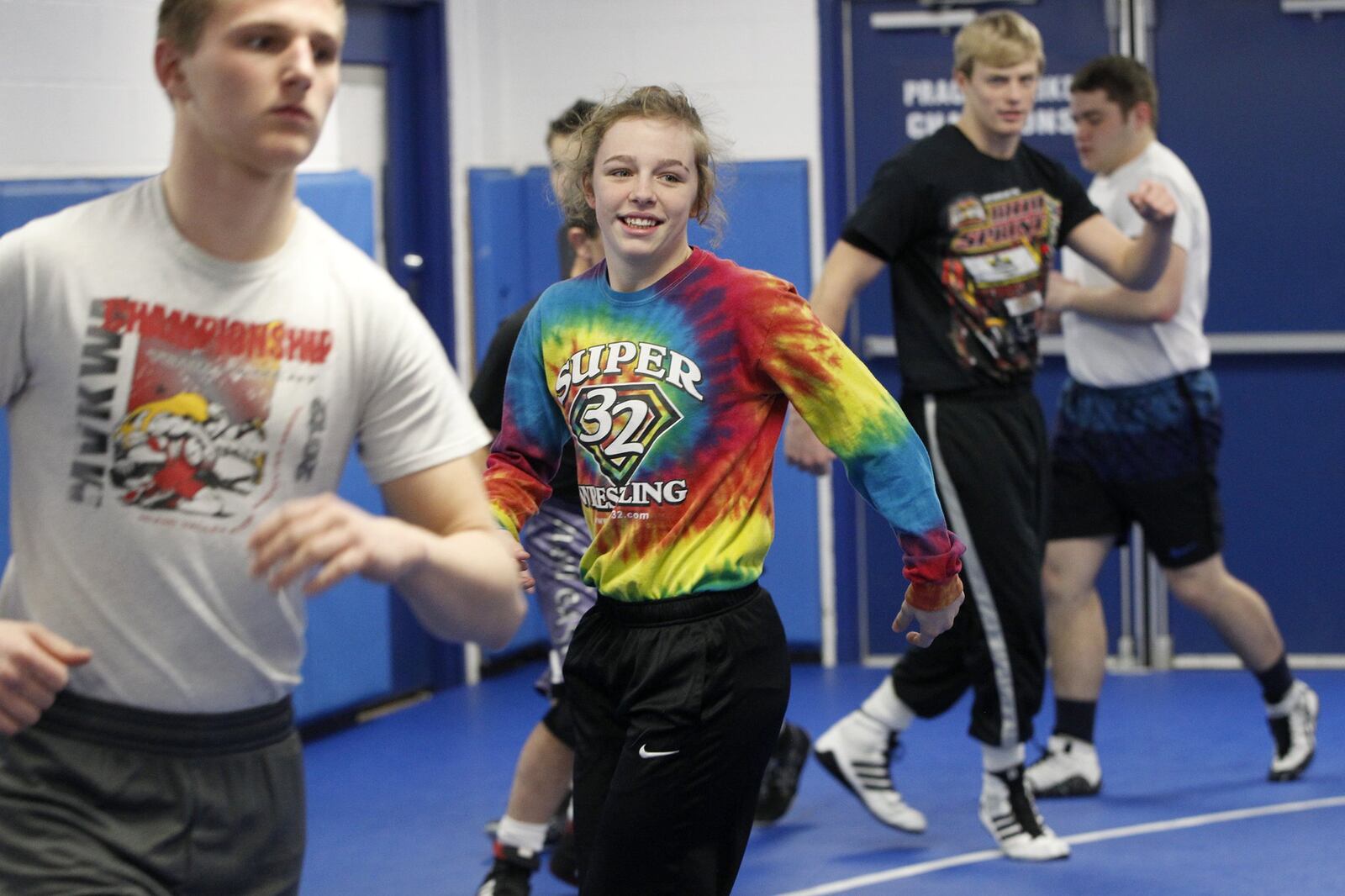 Olivia Shore, 15, wrestles on the Miami East High School boys team. She won the Cadet Freestyle National Championship at 46 kilograms (101.2 pounds) in Irving, Texas in May 2017. LISA POWELL / STAFF