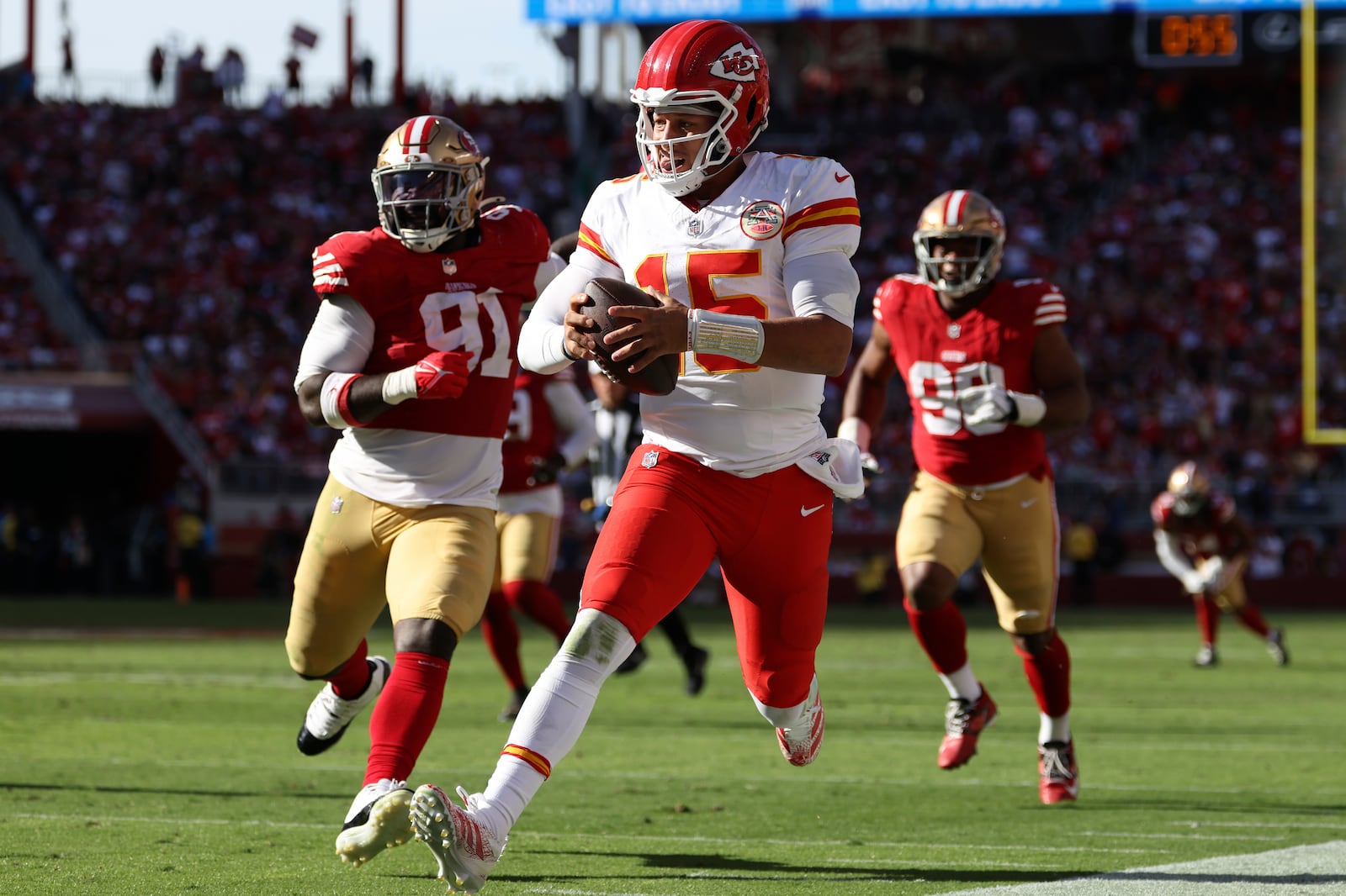 Kansas City Chiefs quarterback Patrick Mahomes (15) runs against the San Francisco 49ers during the second half of an NFL football game in Santa Clara, Calif., Sunday, Oct. 20, 2024. (AP Photo/Jed Jacobsohn)