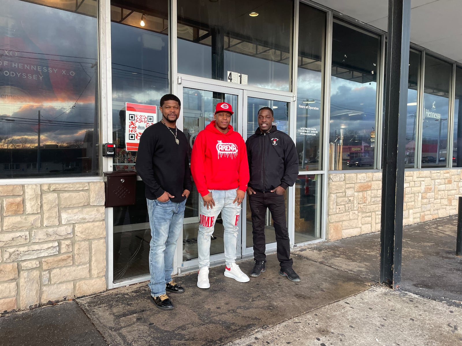 Steven Earnest (left), owner of Lord of the Wings, and Michael Baxter (right), owner of Mother Clucking Chicken Coop, will battle in a chicken competition March 4 at The Arena Sports Bar in Dayton. They are pictured with Ty Bobo (center), owner of The Arena Sports Bar.