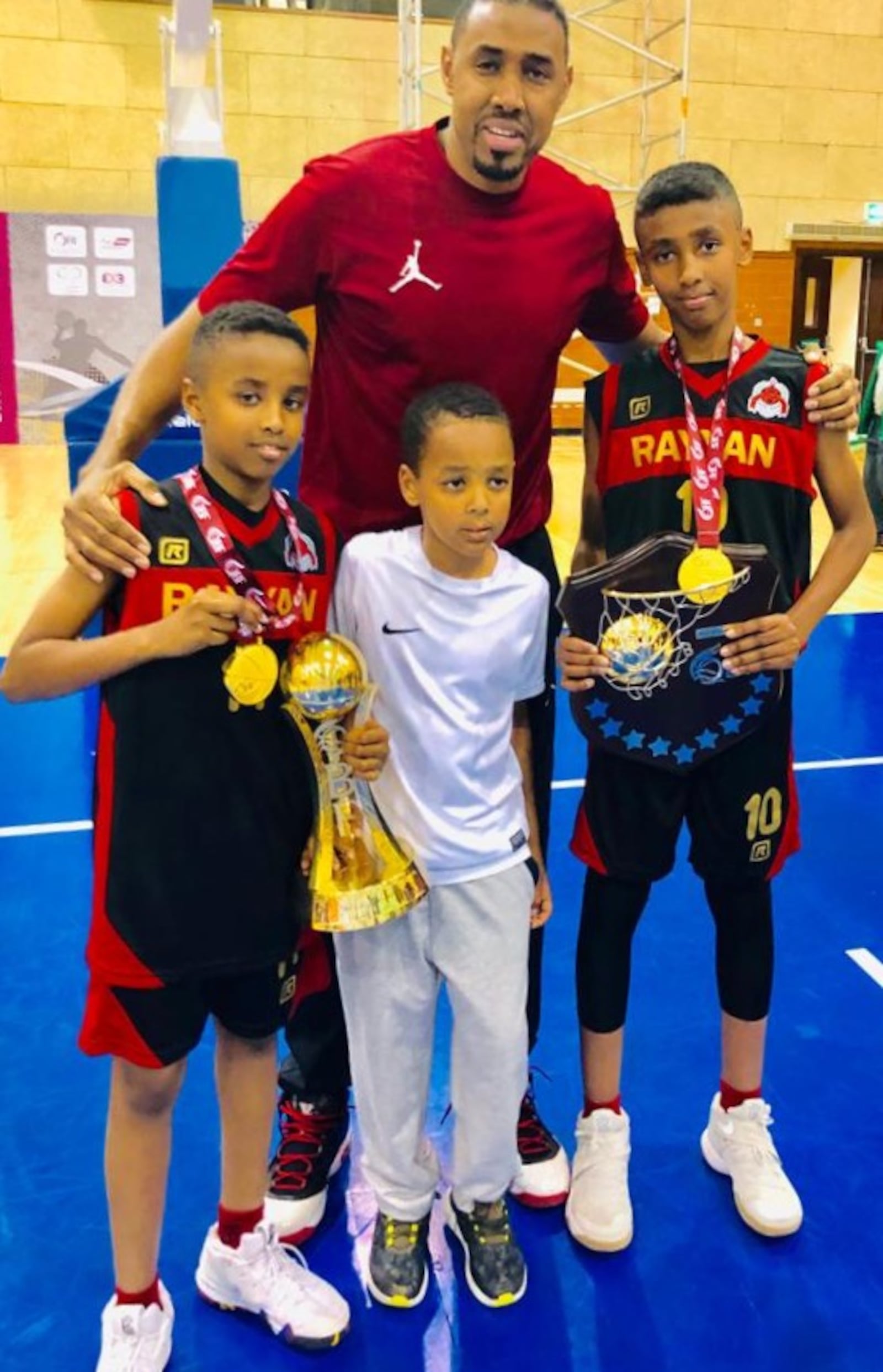 Yassin Mousa and his three boys (left to right):  Abdullah, Ahmed and Hamad. CONTRIBUTED