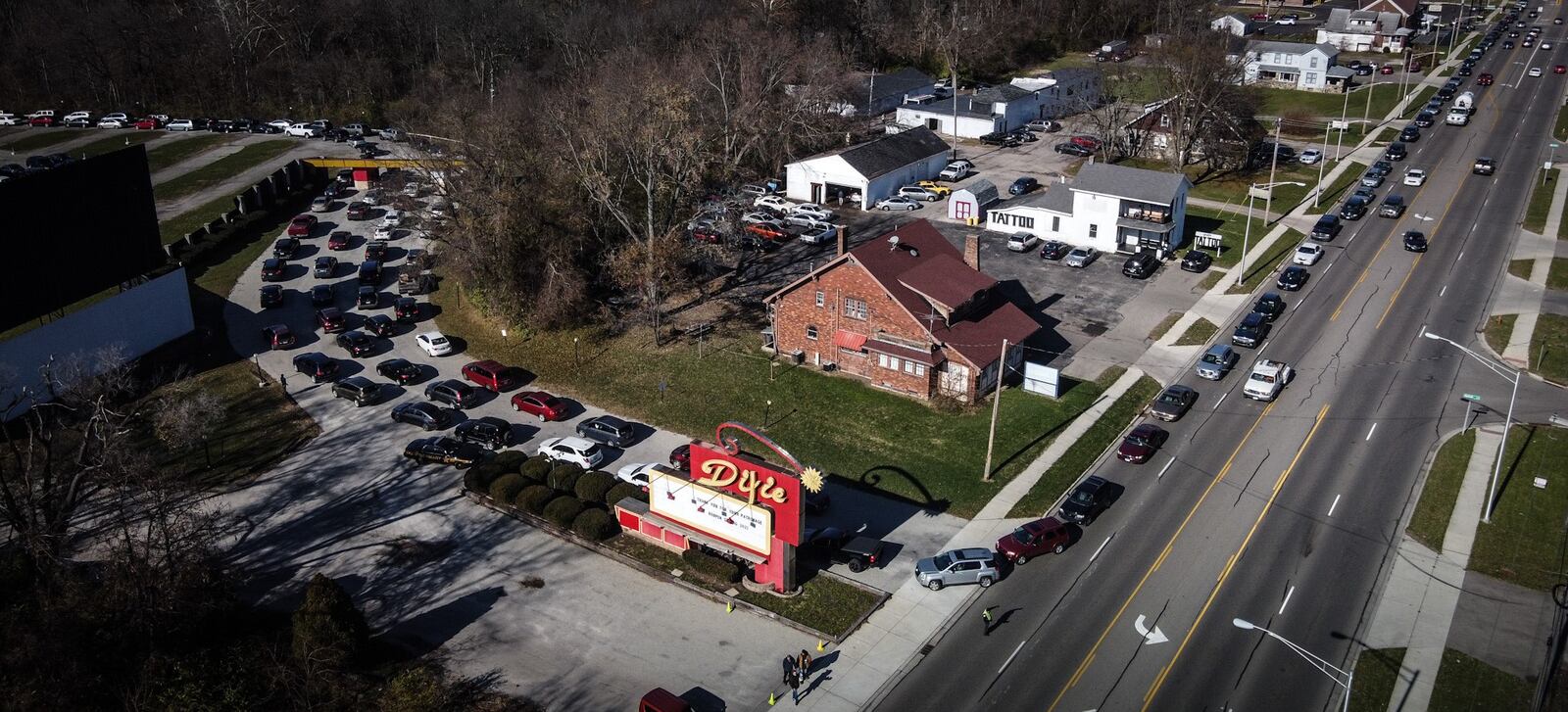 Hundreds of cars lined North DIxie Dr. Tuesday Nov. 23 for a turkey giveaway supported by the Foodbank Inc. and the Levin Family Foundation. Around a 1,000 turkeys were handed out at the Dixie Twin Drive-In.  JIM NOELKER/STAFF