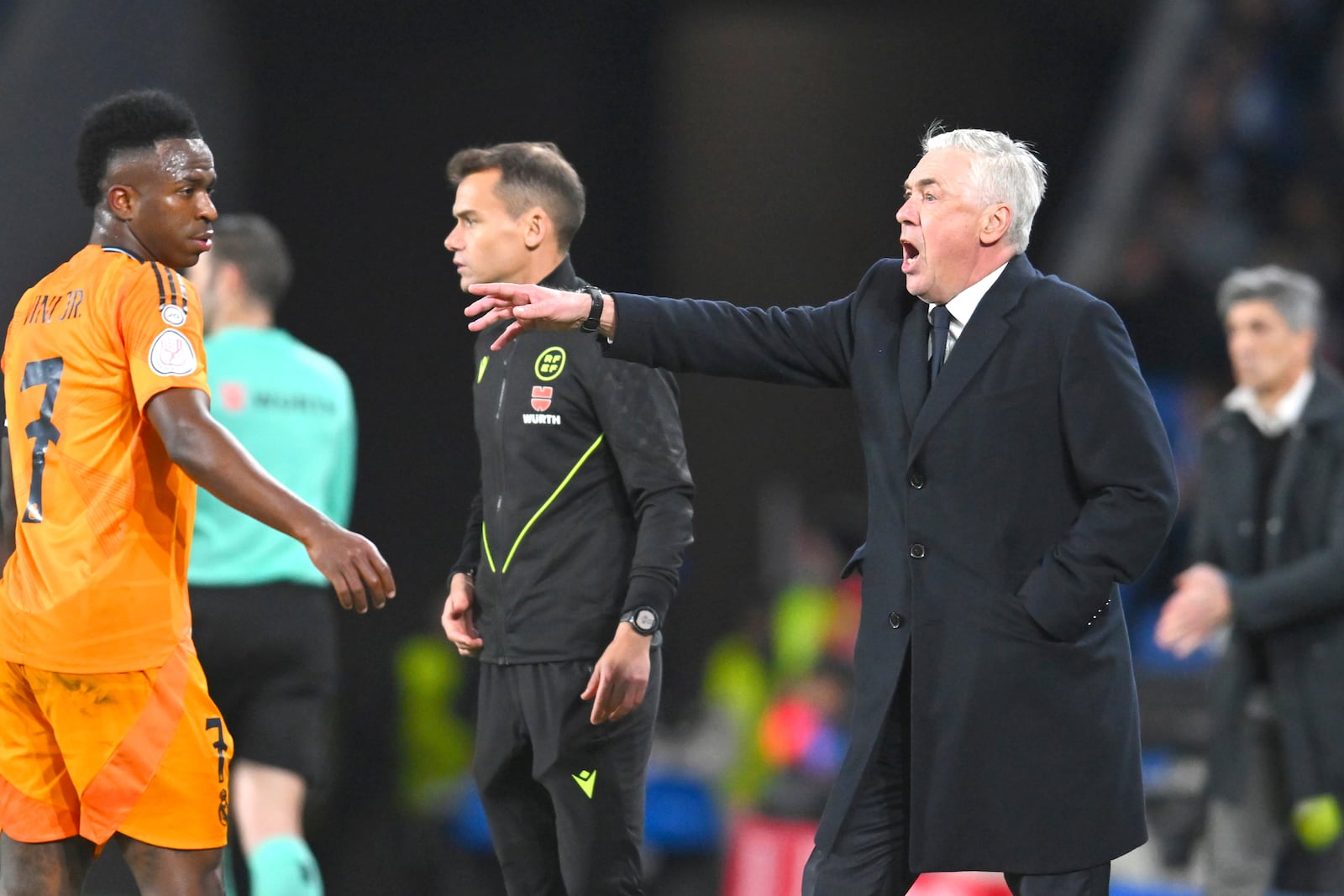 Real Madrid's head coach Carlo Ancelotti gives instructions from the side line during the Spanish Copa del Rey soccer match between Real Sociedad and Real Madrid at the Reale Arena in San Sebastian, Spain, Wednesday, Feb. 26, 2025. (AP Photo/Miguel Oses)