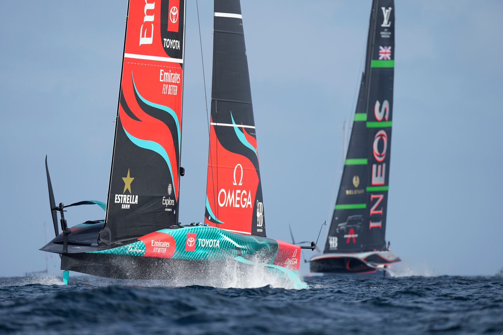 Ineos Britannia and Emirates Team New Zealand race during the Louis Vuitton 37th America's Cup Day 2 race in Barcelona, Spain, Sunday, Oct. 13, 2024. (AP Photo/Bernat Armangue)