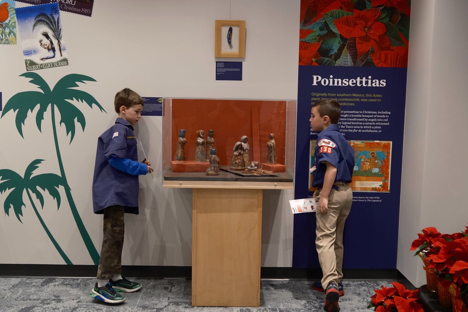 Members of Cub Scout Pack 530 in Centerville participate in “Seek and Find,” one of the activities associated with the exhibit. CONTRIBUTED