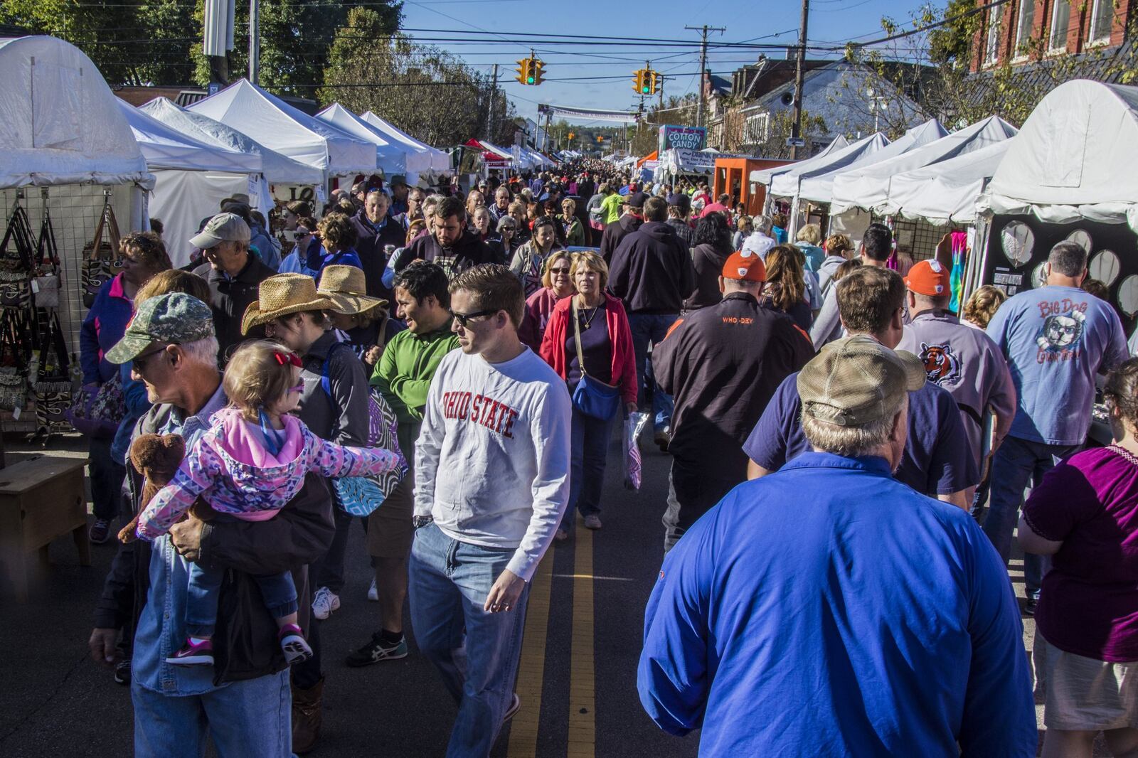 Visitors crowded the streets of Waynesville during the 2016 Ohio Sauerkraut Festival. The village has created new regulations to offset costs and limit liability at this and other village events. RON WILSON/CONTRIBUTED