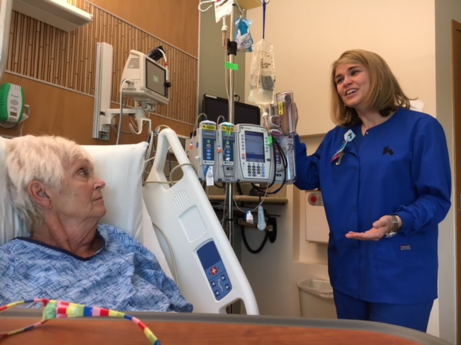 Julie Vincent, right, Kettering Health Network’s chief nursing officer and vice president of patient care, speaks with patient Jane Cox at Sycamore Medical Center recently. Nursing is consistently one of the most in-demand professions according to Ohio’s tracking of online job ads. THOMAS GNAU/STAFF