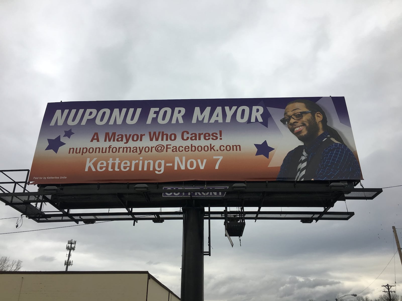 Nuponu Gorneleh is running for Kettering mayor. He denied knowing who paid for this billboard on Woodman Avenue but his campaign finance report shows his campaign paid for it. Mayor Don Patterson alleges it violates Ohio elections law because it implies that Gorneleh is already mayor. LYNN HULSEY/Staff