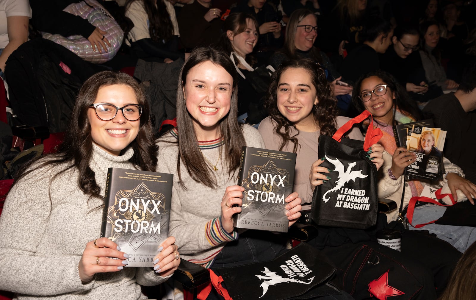 Audience members attend author Rebecca Yarros in conversation of her new book "Onyx Storm" at The Town Hall on Friday, Jan. 24, 2025, in New York. (Photo by CJ Rivera/Invision/AP)