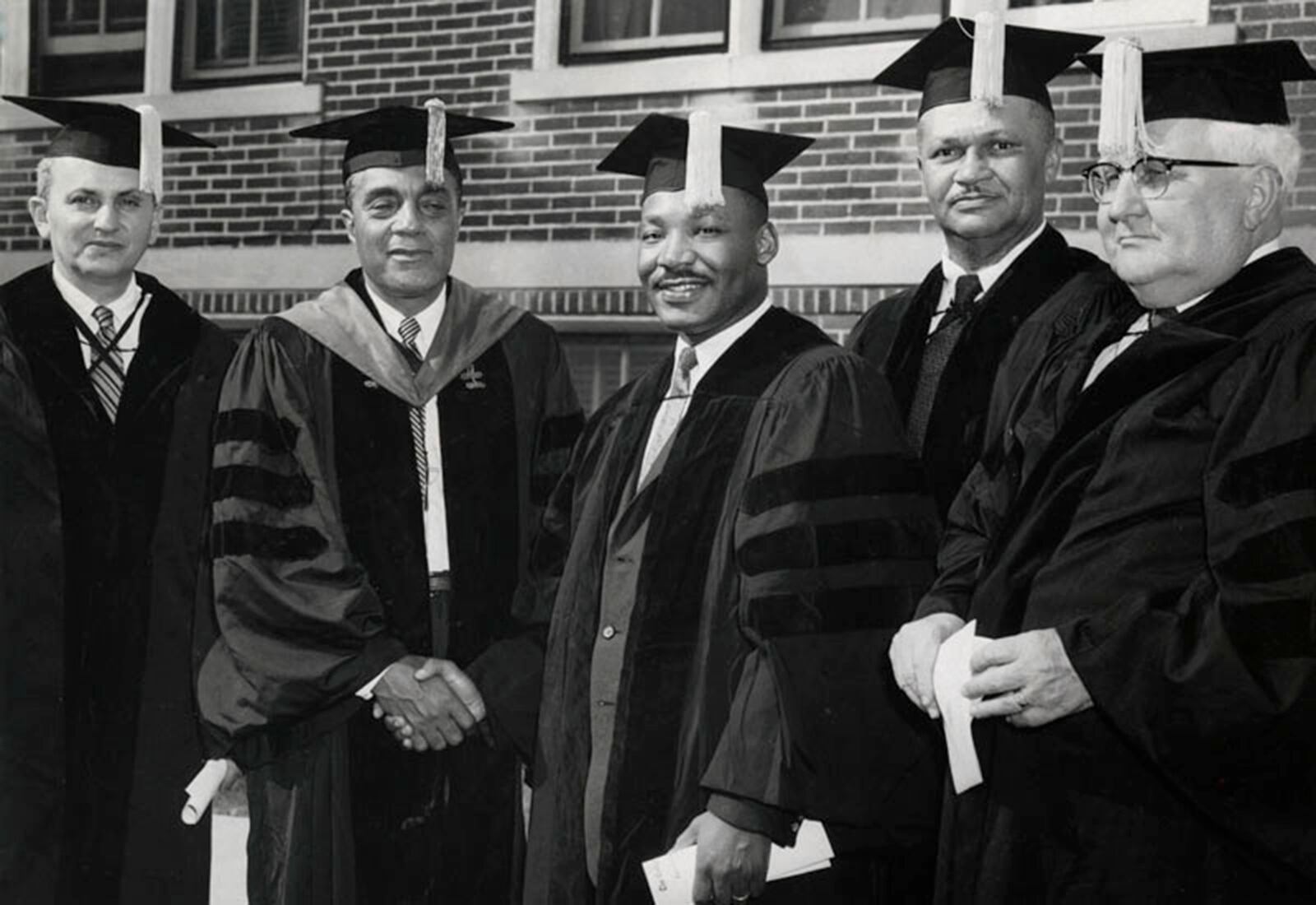 Dr. Martin Luther King, Jr. (center) received an honorary degree from Central State University in 1958. DAYTON DAILY NEWS ARCHIVES