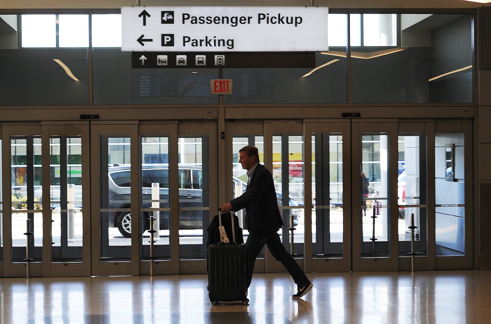 Travelers made their way through the Dayton International Airport Thursday, Oct. 20, 2022. MARSHALL GORBY\STAFF