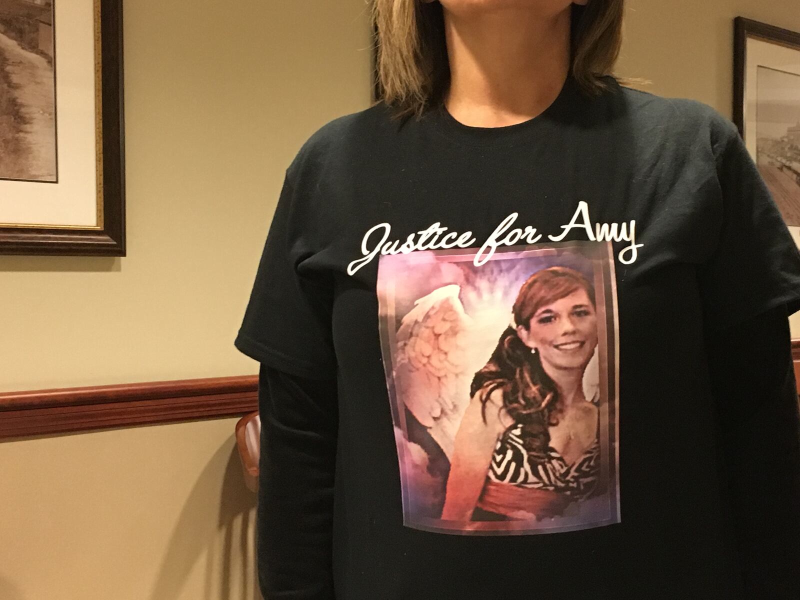 Bonnie Risner, aunt of Amy Risner, who was killed at a Monroe residence earlier this month, wore a shirt in remembrance of the mother of three during a court hearing Wednesday in Butler County Common Pleas Court for Jordan Lay and Nicholas Mattox who are charged in connection with her death. LAUREN PACK/STAFF