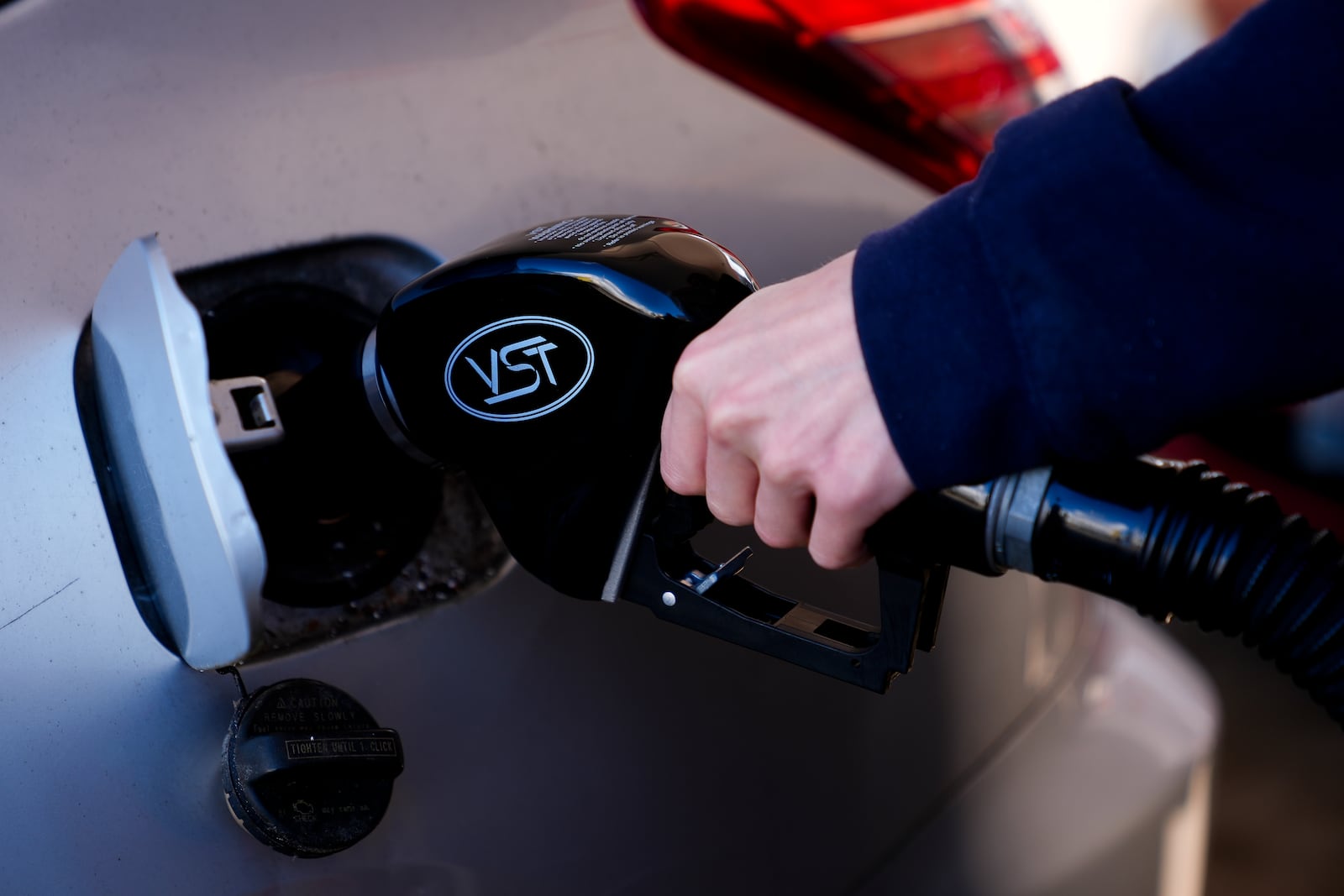 FILE - A driver fills up at a gasoline pump at a Shell gas station, Oct. 9, 2024, in Seattle. (AP Photo/Lindsey Wasson, File)