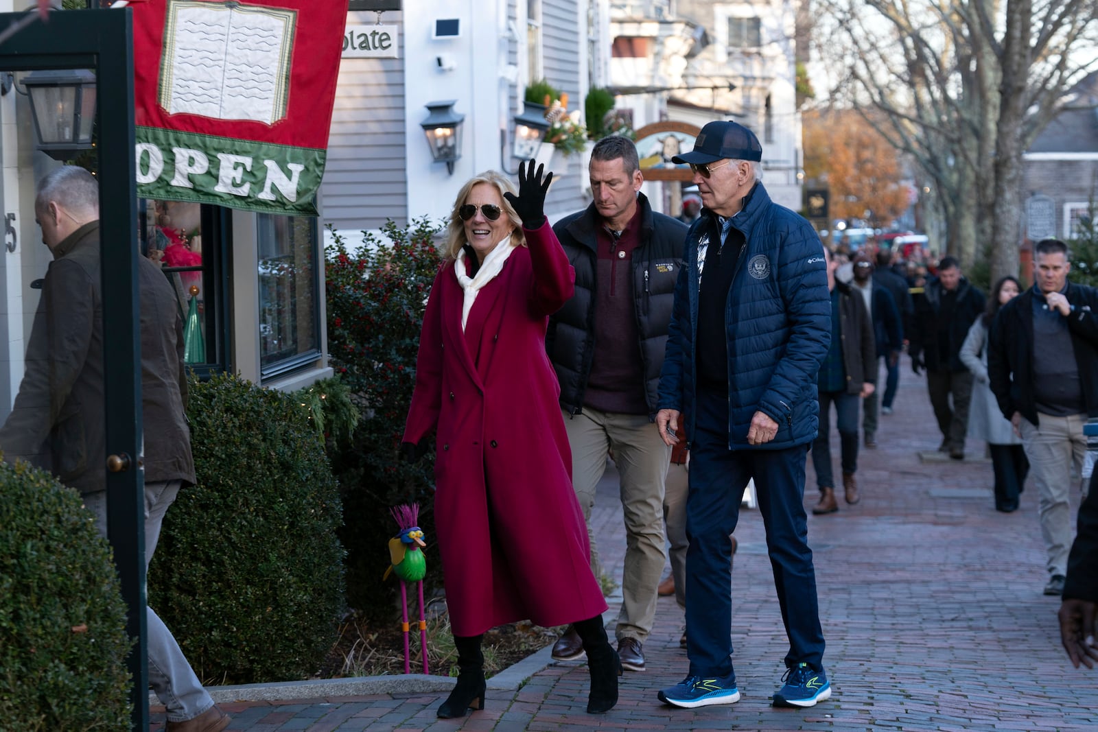 President Joe Biden, right, and first lady Jill Biden visit shops as they walk in downtown Nantucket Mass., Friday, Nov. 29, 2024. (AP Photo/Jose Luis Magana)