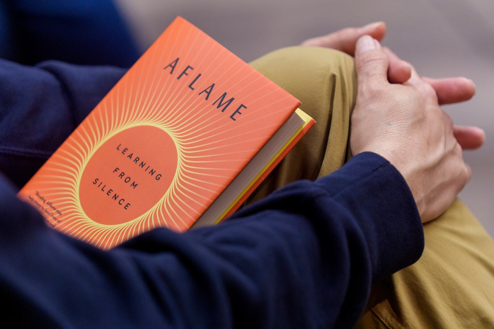 Jeremy Hunter, Founder of the Executive Mind Leadership Institute, who lost his Holmes House in the Eaton Fire, listens to author Pico Iyer present his book "Aflame: Learning from Silence" at Vroman's bookstore in Pasadena, Calif., on Tuesday, Jan. 28, 2025. (AP Photo/Damian Dovarganes)