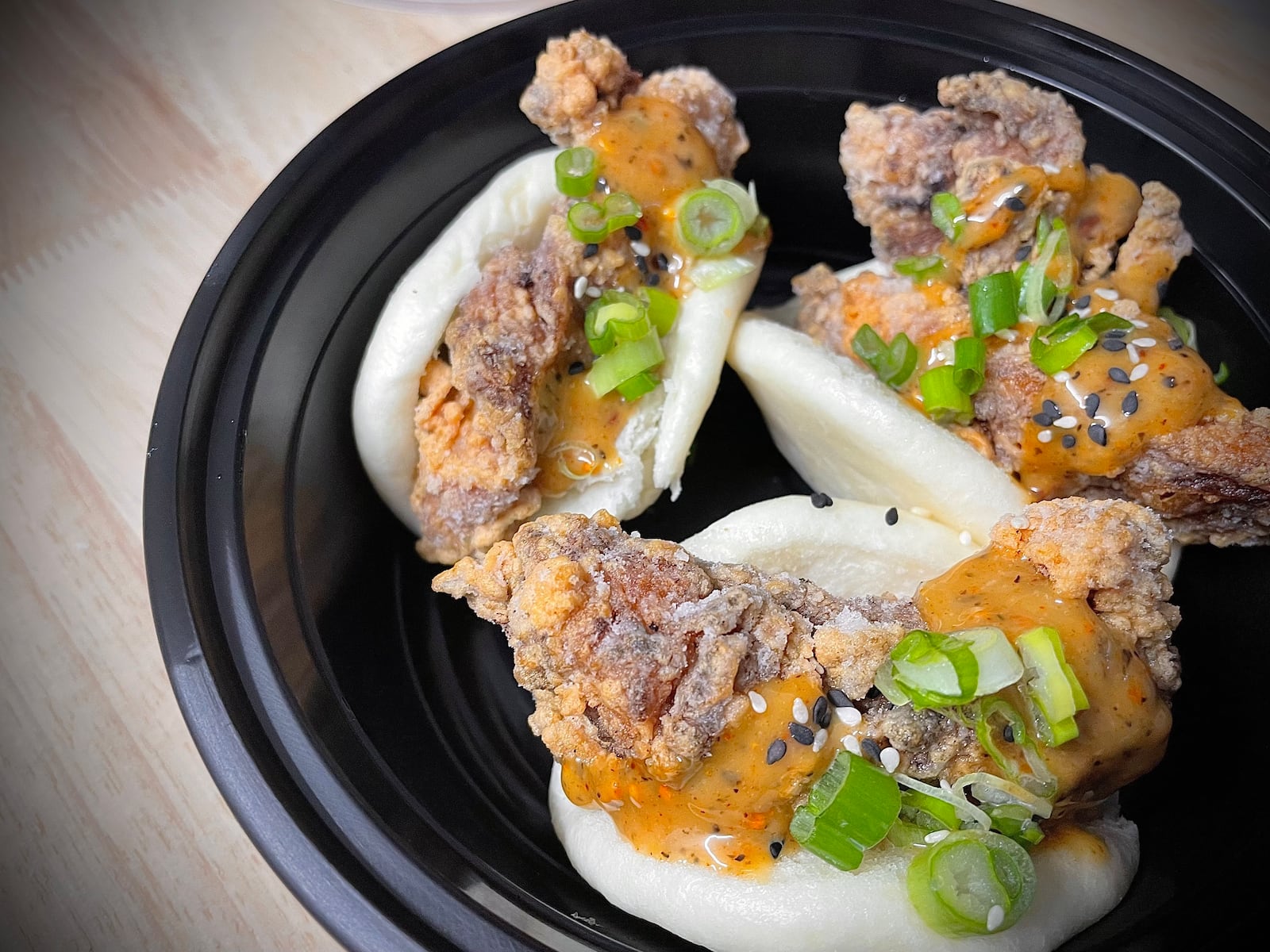 Nood Bar, a new concept by Chef Dane Shipp, is one of four vendors located inside The Silos. The restaurant serves authentic Asian-inspired noodle dishes with an assortment of bao buns and dumplings. NATALIE JONES/STAFF