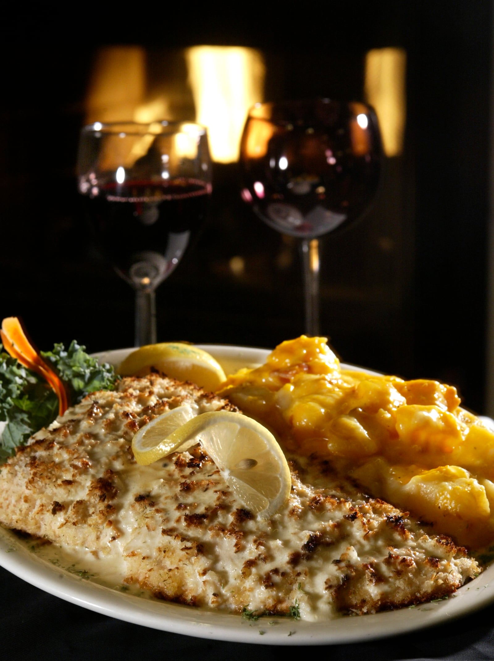 Horseradish encrusted salmon and au gratin potatoes at The Barnsider restaurant in Dayton.  Staff photo by Lisa Powell