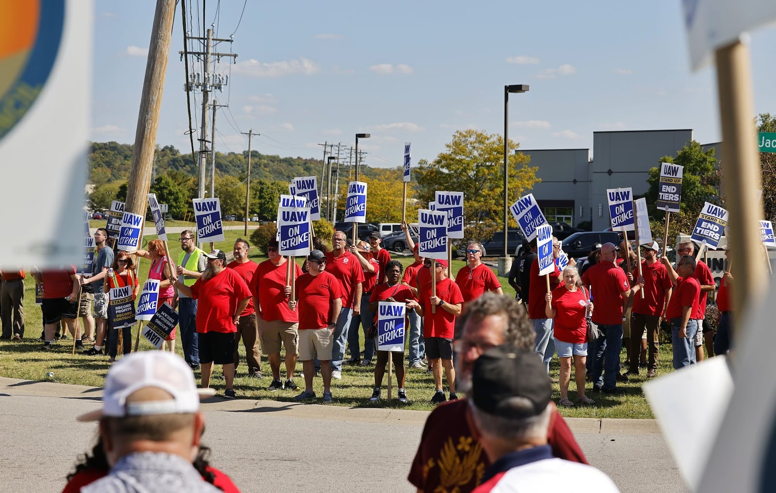 Members and supporters of Dayton's AFL-CIO union joined striking UAW Local 674 workers on the picket line in solidarity Tuesday, Oct. 3, 2023 West Chester Township. The UAW 674 members are on strike at the General Motors Parts Distribution Center on Jacquemin Drive. NICK GRAHAM/STAFF