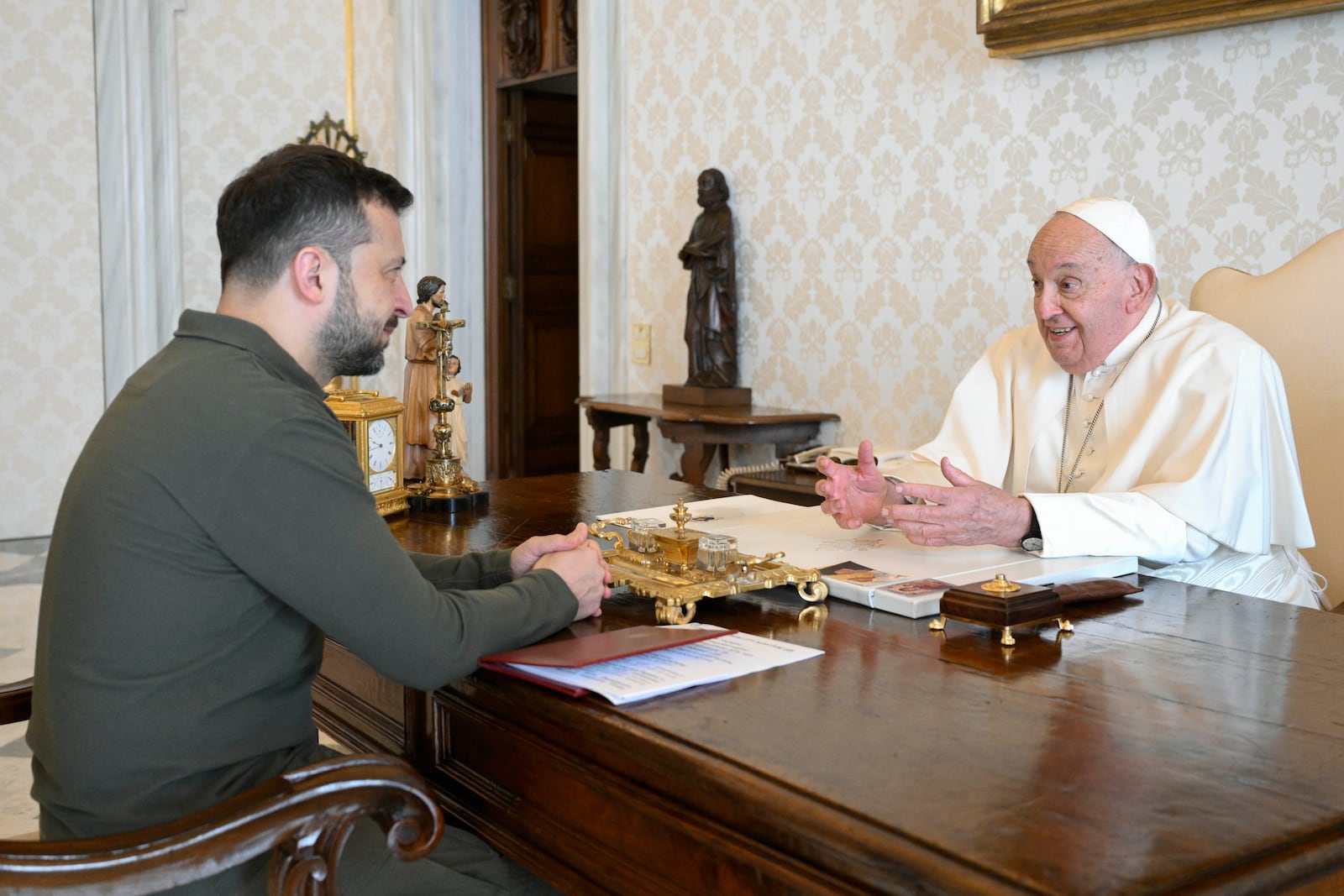 Ukraine's President Volodymyr Zelenskyy, left, arrives for a private audience with Pope Francis at The Vatican, Friday, Oct. 11, 2024. (Vatican Media via AP)