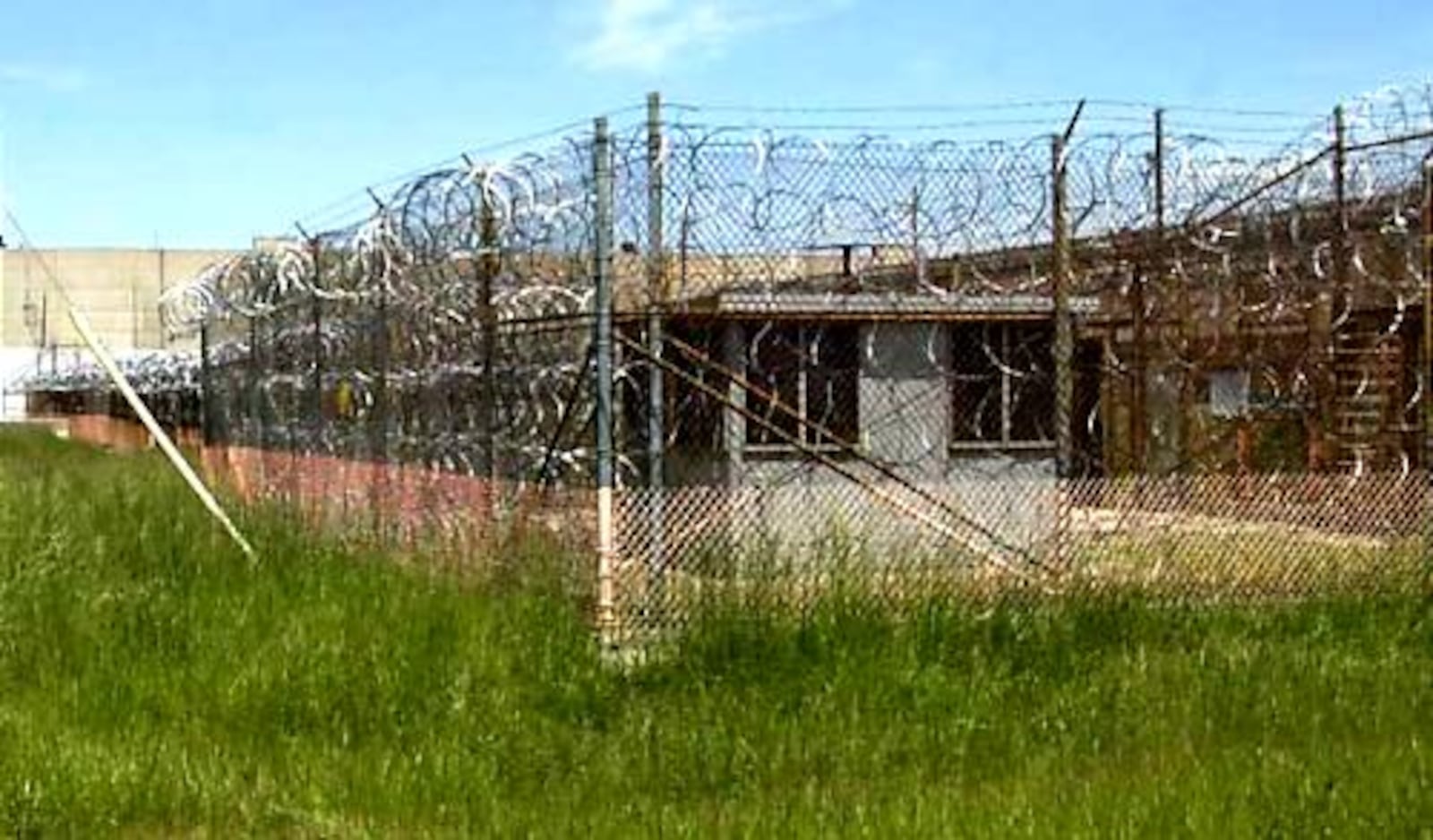 Razor wire surrounds a building at the Portsmouth Gaseous Diffusion Plant near Piketon. High security was necessary because the plant stored high enriched uranium for weapons.