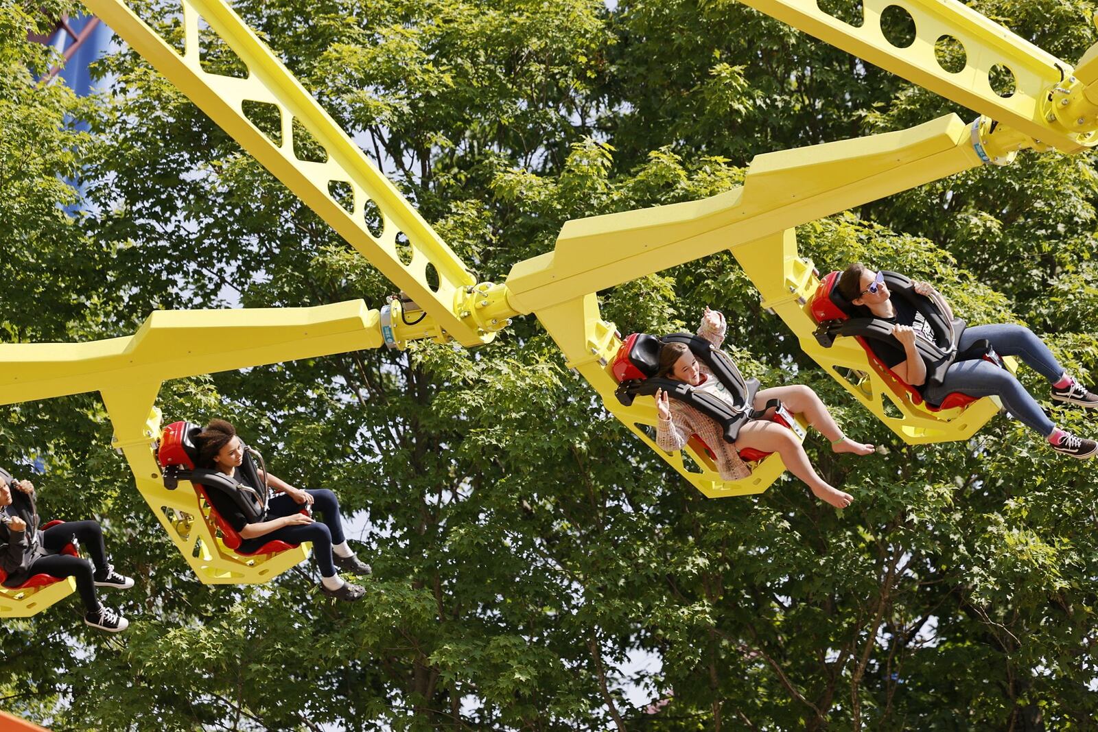 Kings Island visitors got to experience the newest themed area "Adventure Port" before the official opening day Friday, June 9, 2023 in Mason. The area features Enrique's Restaurant and Mercados Patio Bar, Adventure Express coaster and two new rides, Sol Spin and Cargo Loco. NICK GRAHAM/STAFF