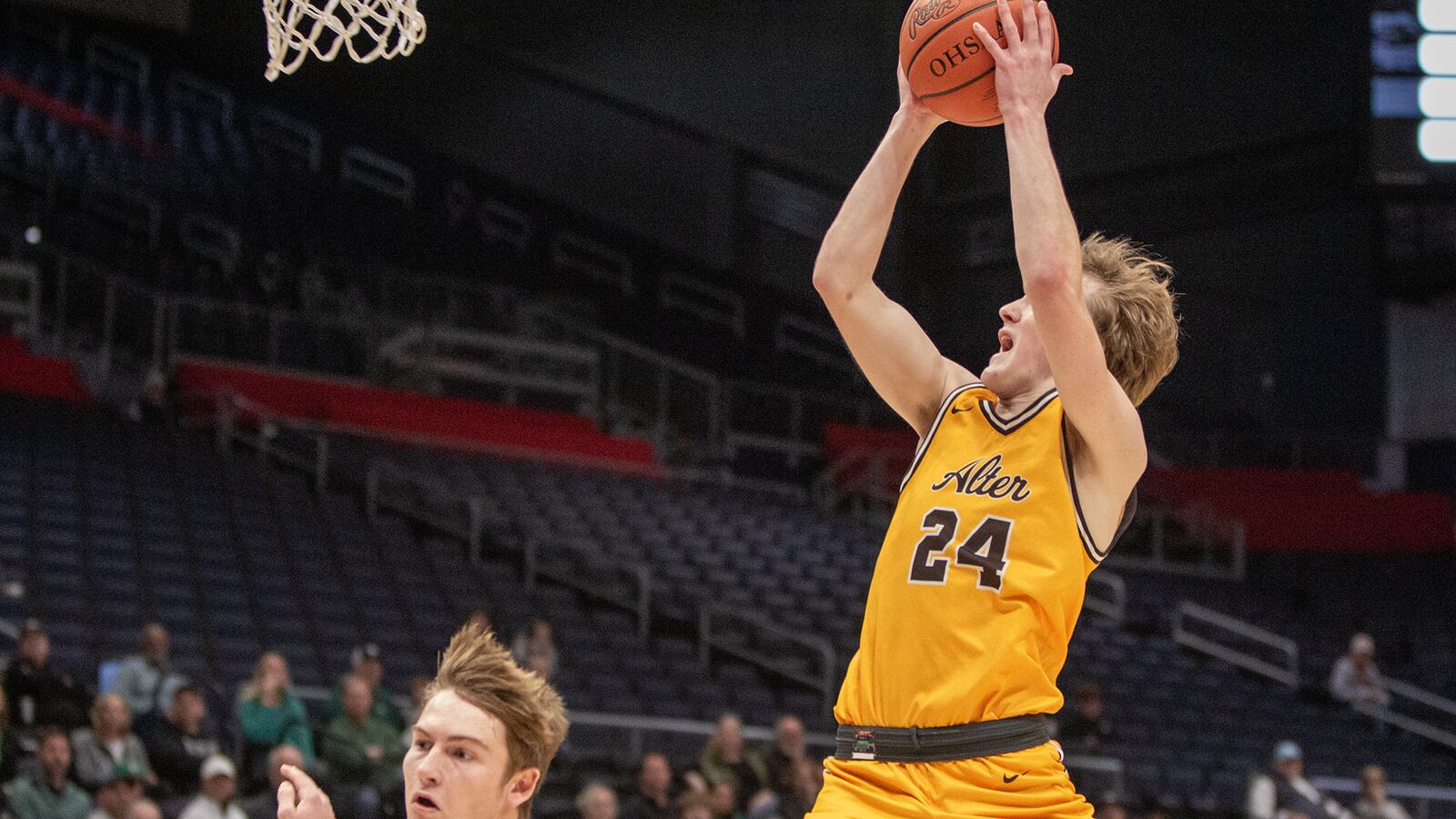 Alter's Joe Brand drives to the basket during the first half of Saturday morning's Division II district final against Cincinnati McNicholas at UD Arena. Jeff Gilbert/CONTRIBUTED