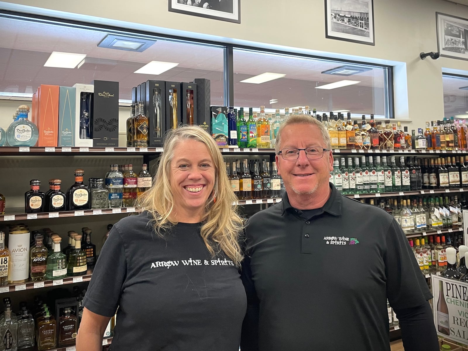 Pictured is Beth Freyvogel and Mif Frank, third-generation owners of Arrow Wine & Spirits. NATALIE JONES/STAFF