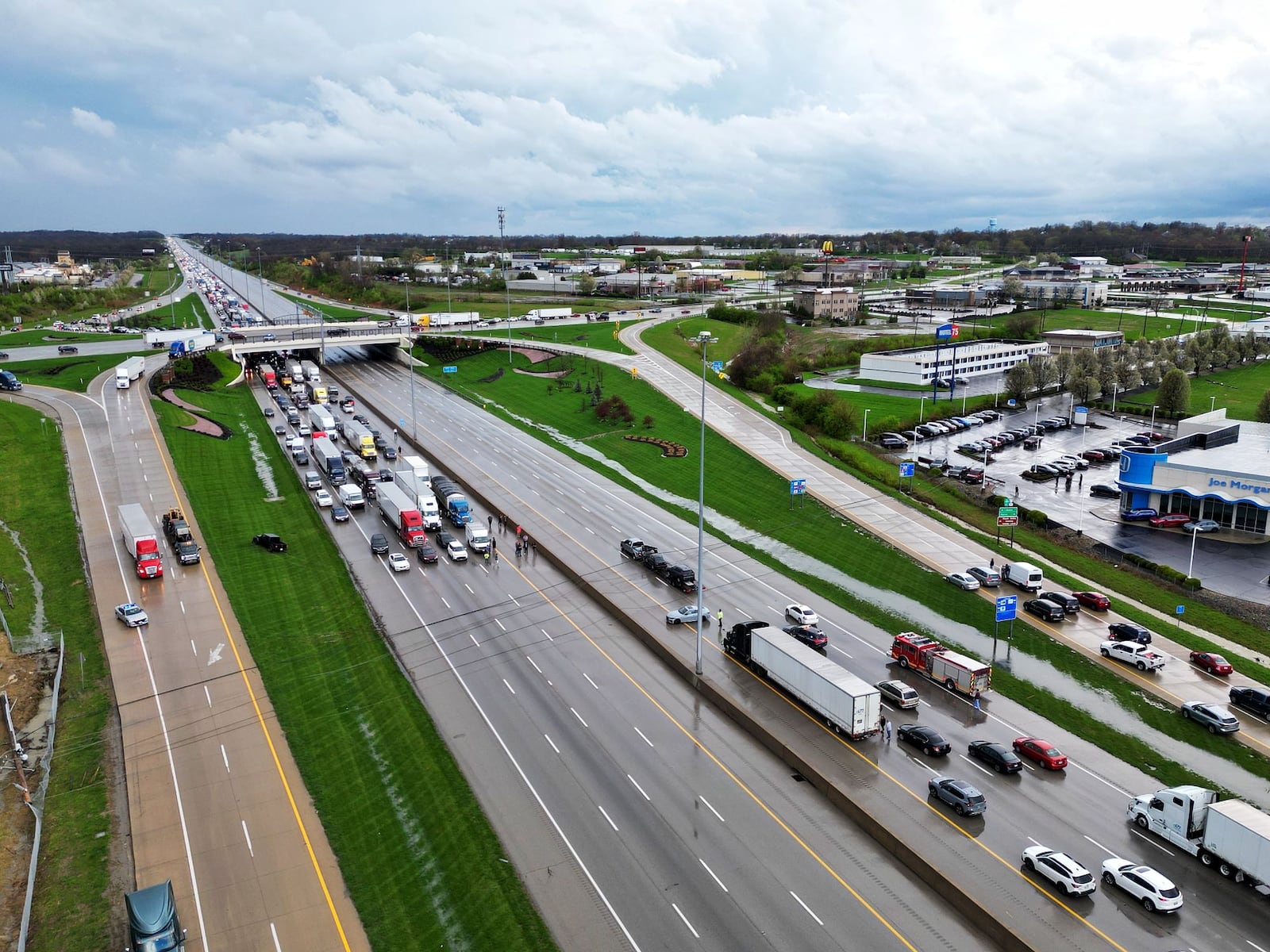 Interstate 75 was closed in both directions Tuesday, April 2, 2024, in Monroe after strong winds during a thunderstorm knocked wires down across the highway. NICK GRAHAM/STAFF