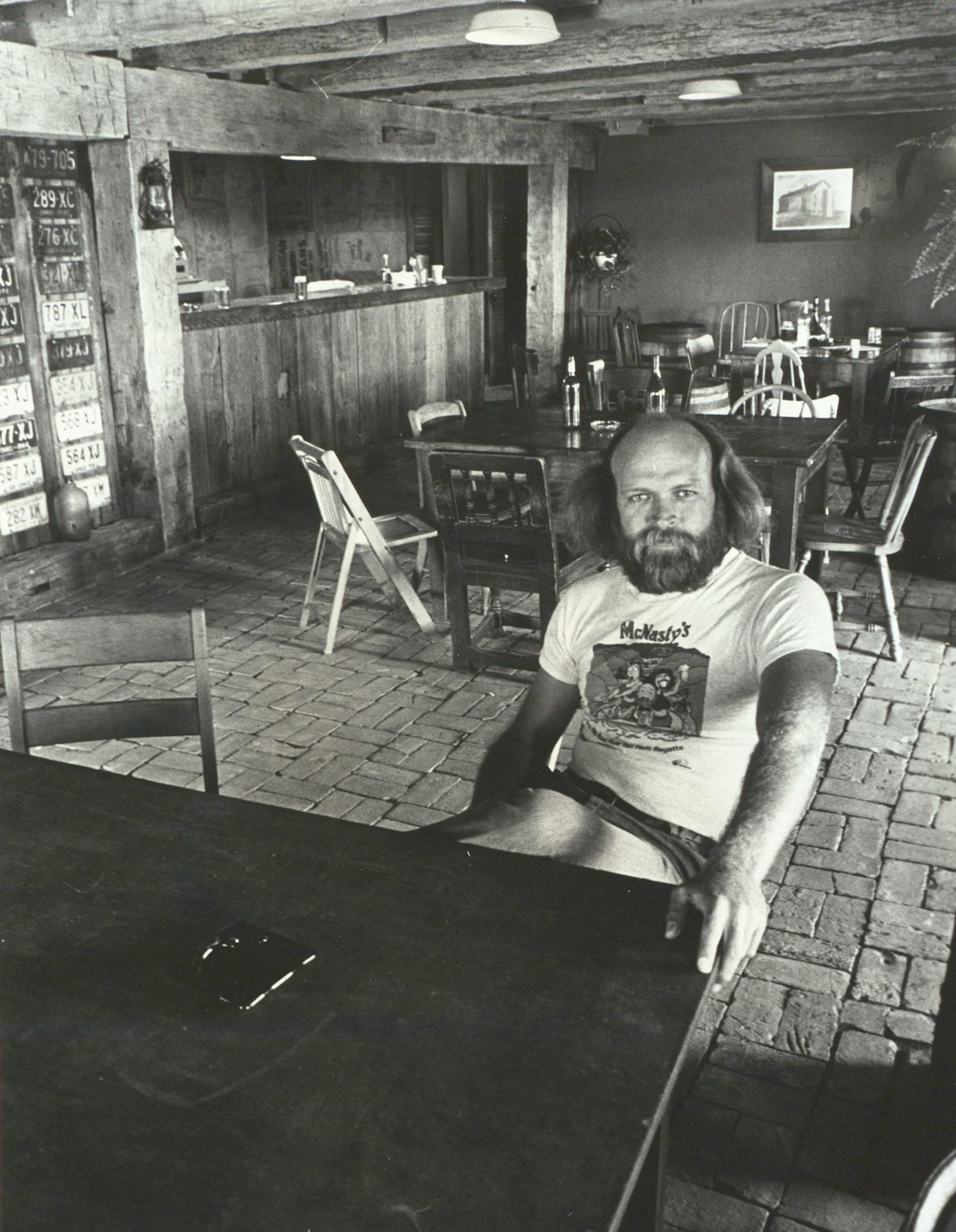 Dick Bell, photographed in 1978, at a historic barn on Rip Rap Road he renovated into a tavern and named McNasty's. McNasty's was open from 1978 to 1996. Today it is the Rip Rap Road House. DAYTON DAILY NEWS / WRIGHT STATE UNIVERSITY SPECIAL COLLECTIONS