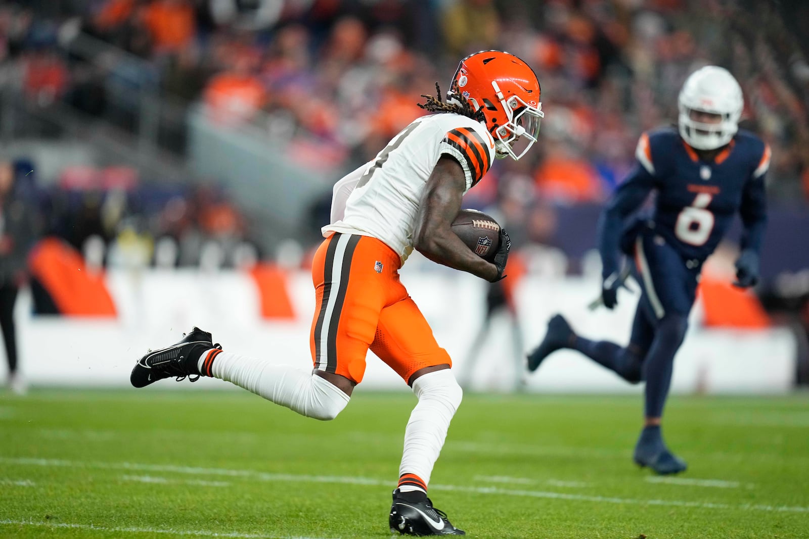 Cleveland Browns wide receiver Jerry Jeudy runs for a first down during the first half of an NFL football game against the Denver Broncos, Monday, Dec. 2, 2024, in Denver. (AP Photo/Jack Dempsey)