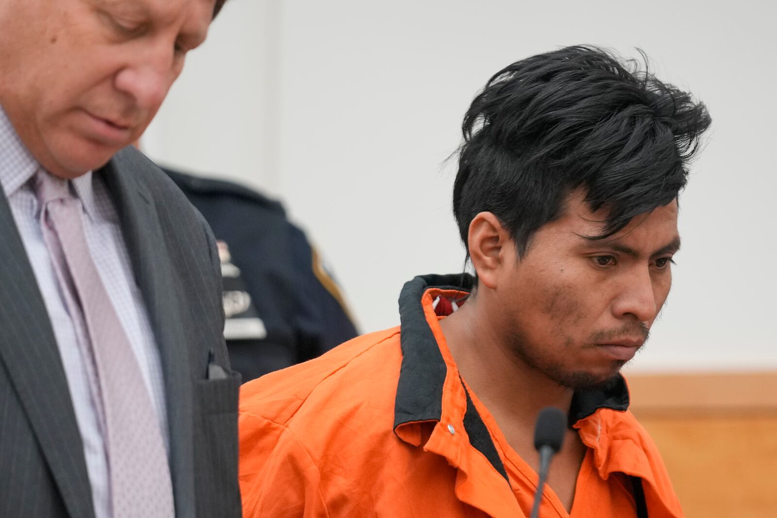 Sebastian Zapeta, right, accused of burning a woman to death inside a New York City subway train, appears in Kings County Supreme Court for an arraignment, Tuesday, Jan. 7, 2025, in New York. (AP Photo/Seth Wenig)