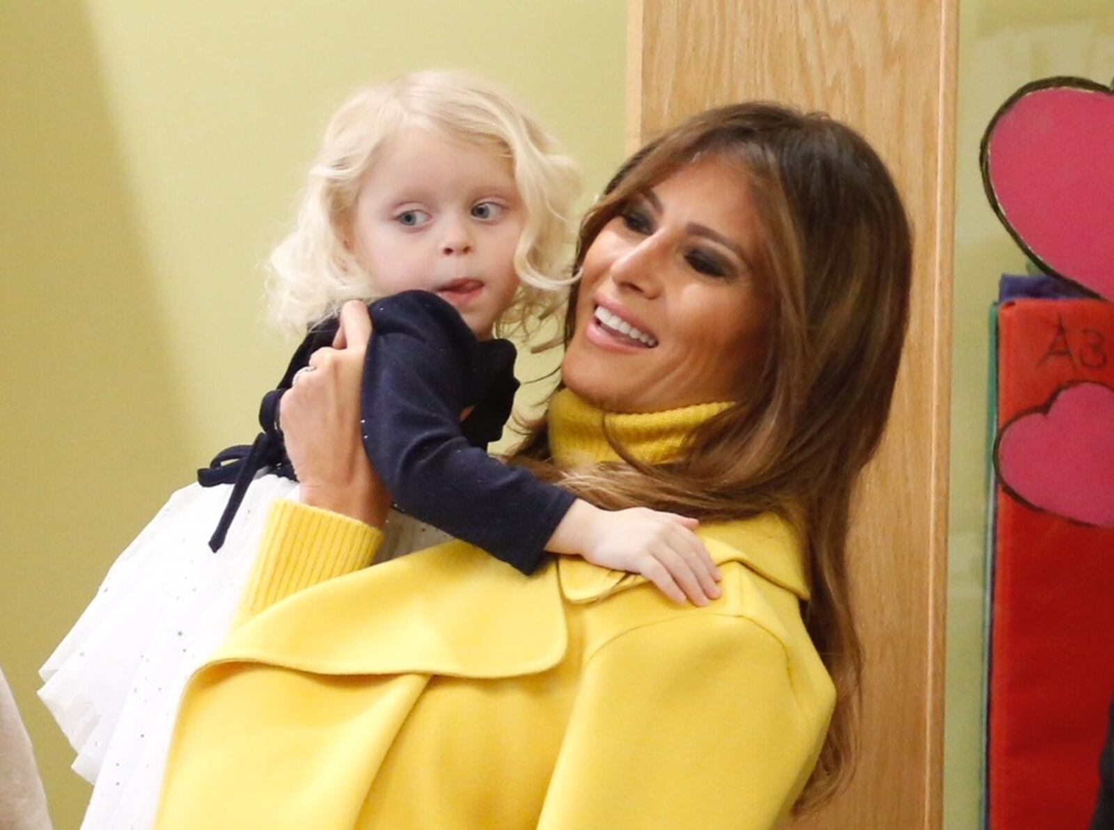 First lady Melania Trump hods a child at Cincinnati’s Children’s Hospital on Monday. Staff photo by Lisa Powell