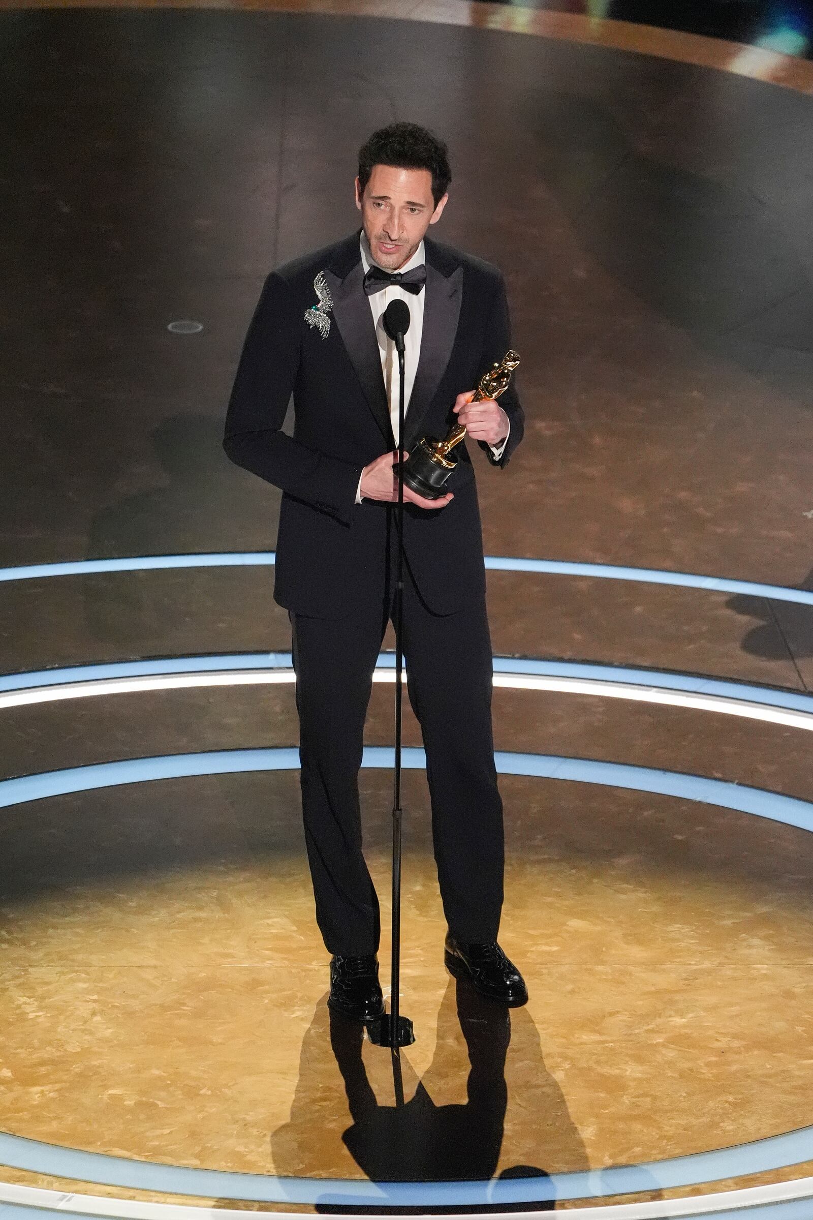 Adrien Brody accepts the award for best performance by an actor in a leading role for "The Brutalist" during the Oscars on Sunday, March 2, 2025, at the Dolby Theatre in Los Angeles. (AP Photo/Chris Pizzello)