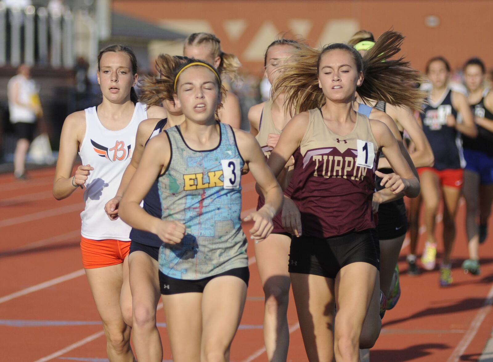 Centerville sophomore Emma Bucher (3) was the runner-up and sophomore Juliann Williams of Beavercreek (left) fourth in the 1,600 meters during the D-I regional track and field meet at Wayne High School on Friday, May 24, 2019. MARC PENDLETON / STAFF