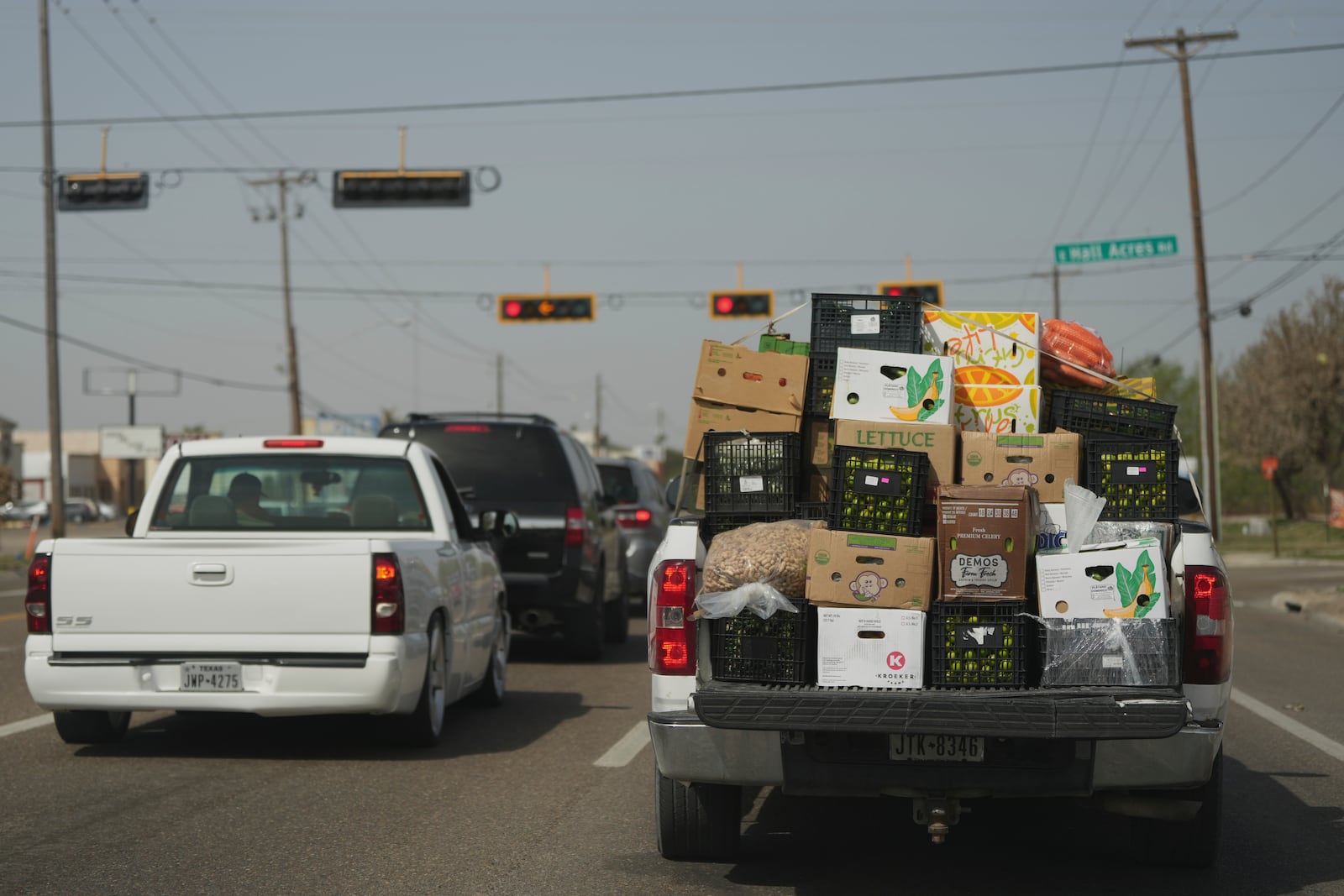 A truck loaded with produce passes through Pharr, Texas, Tuesday, March 4, 2025. (AP Photo/Eric Gay)