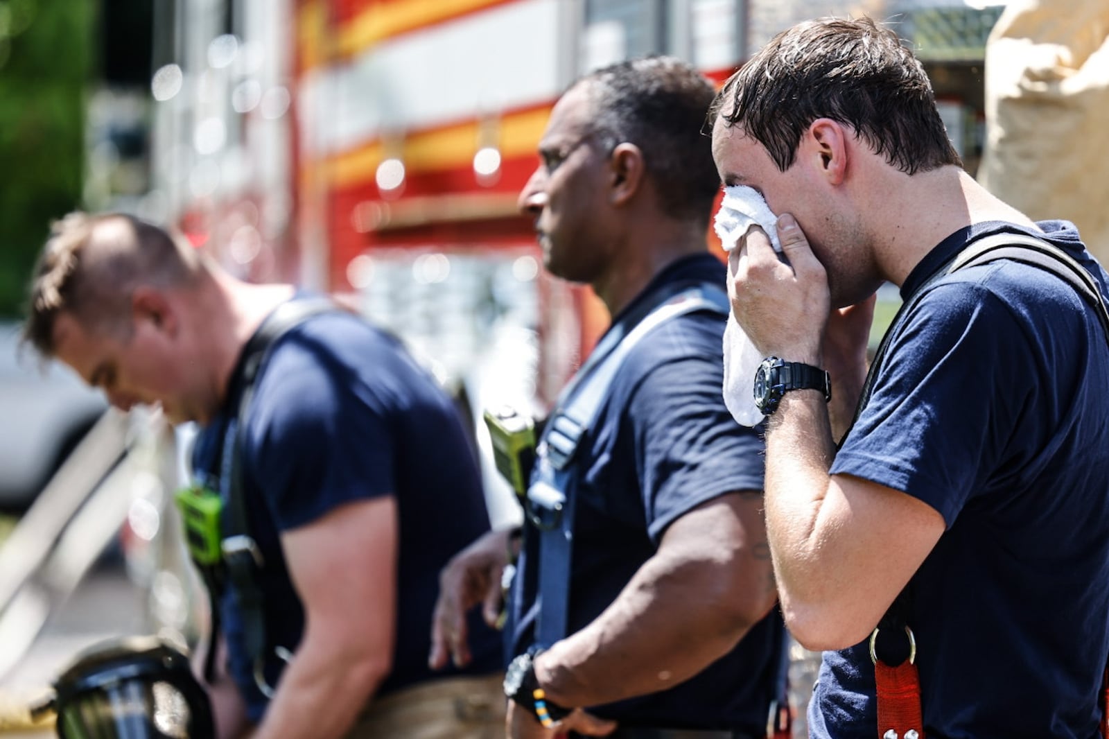 With temperatures near 90 degrees, Dayton firefighters battled the heat Friday, July 14, 2023, along with an apartment fire on Huffman Avenue. One unit in the four-unit building was occupied with one person displaced. No one was injured. JIM NOELKER/STAFF