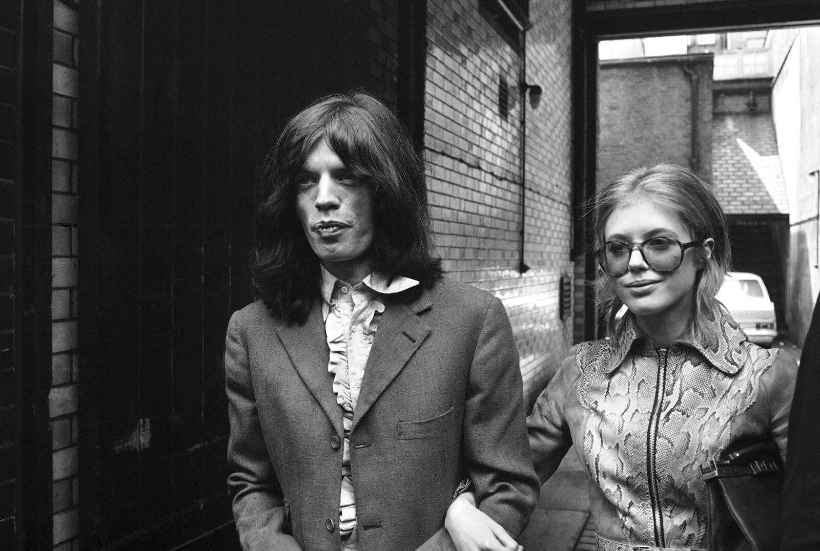 FILE - Mick Jagger, lead singer of the Rolling Stones pop-group and actress Marianne Faithfull on May 29, 1969, after police arrested them at a house in Chelsea, London. (AP Photo/Peter Kemp, File)