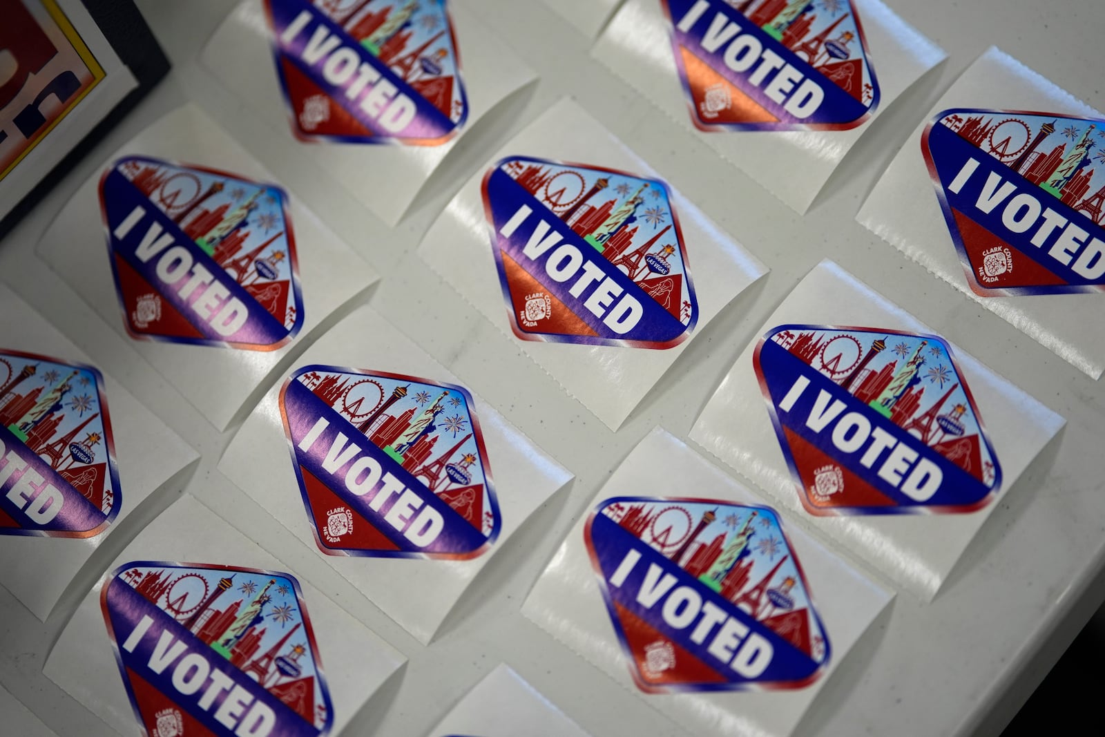 I voted stickers are on display at a polling place, Wednesday, Oct. 30, 2024, in Las Vegas. (AP Photo/John Locher)