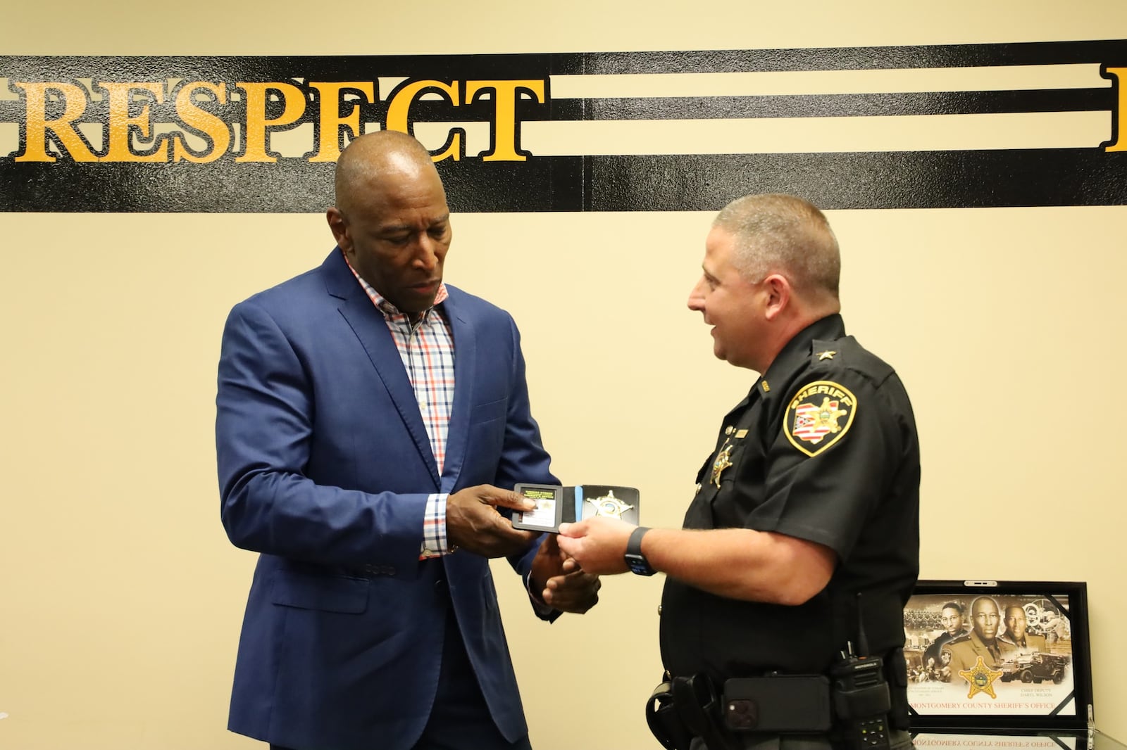 Montgomery County Sheriff Rob Streck thanks Chief Deputy Daryl Wilson for his service. Photo provided by the Montgomery County Sheriff's Office.