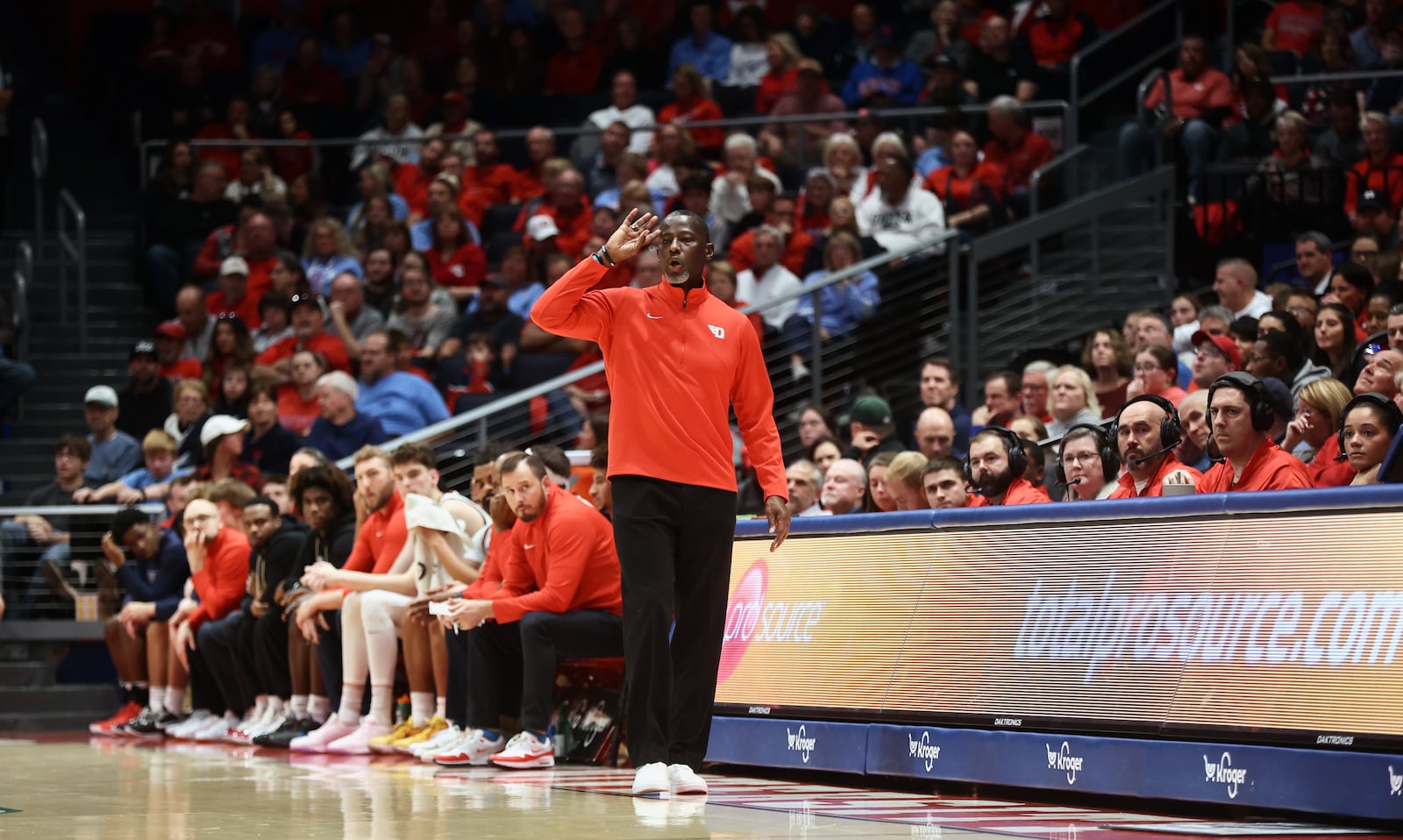 Dayton's Anthony Grant coaches during a game against Capital on Saturday, Nov. 16, 2024, at UD Arena. David Jablonski/Staff