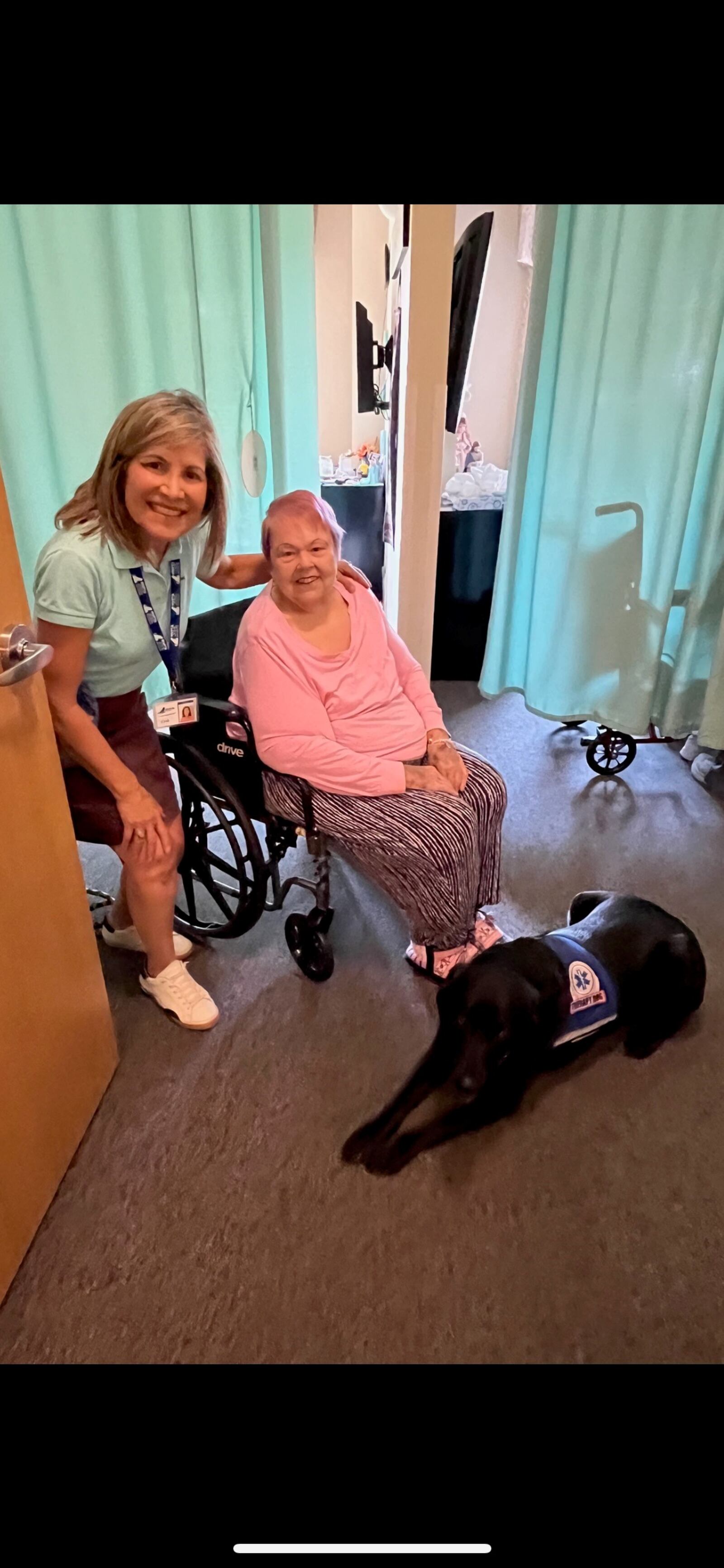 Cindi Heck and Grace pay a visit to nursing home resident, Barbara Williams. CONTRIBUTED