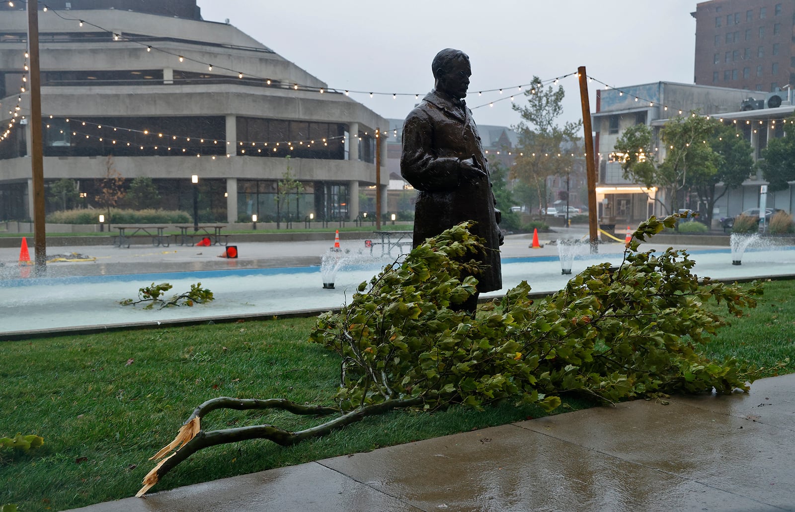 A large limb rests on the Springfield City Hall Plaza after it fell out of a nearby tree Friday, Sept. 27, 2024. BILL LACKEY/STAFF