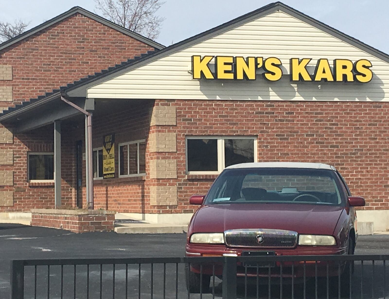 An archive photo of Ken’s Kars, which closed down. The property is being targeted for new housing and an express car wash. CORNELIUS FROLIK / STAFF