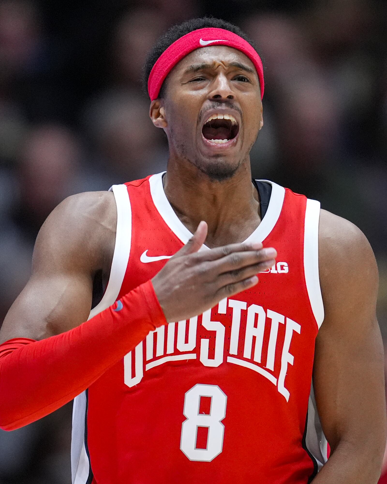 Ohio State guard Micah Parrish (8) celebrates after a three-point basket against Purdue during the second half of an NCAA college basketball game in West Lafayette, Ind., Tuesday, Jan. 21, 2025. (AP Photo/Michael Conroy)