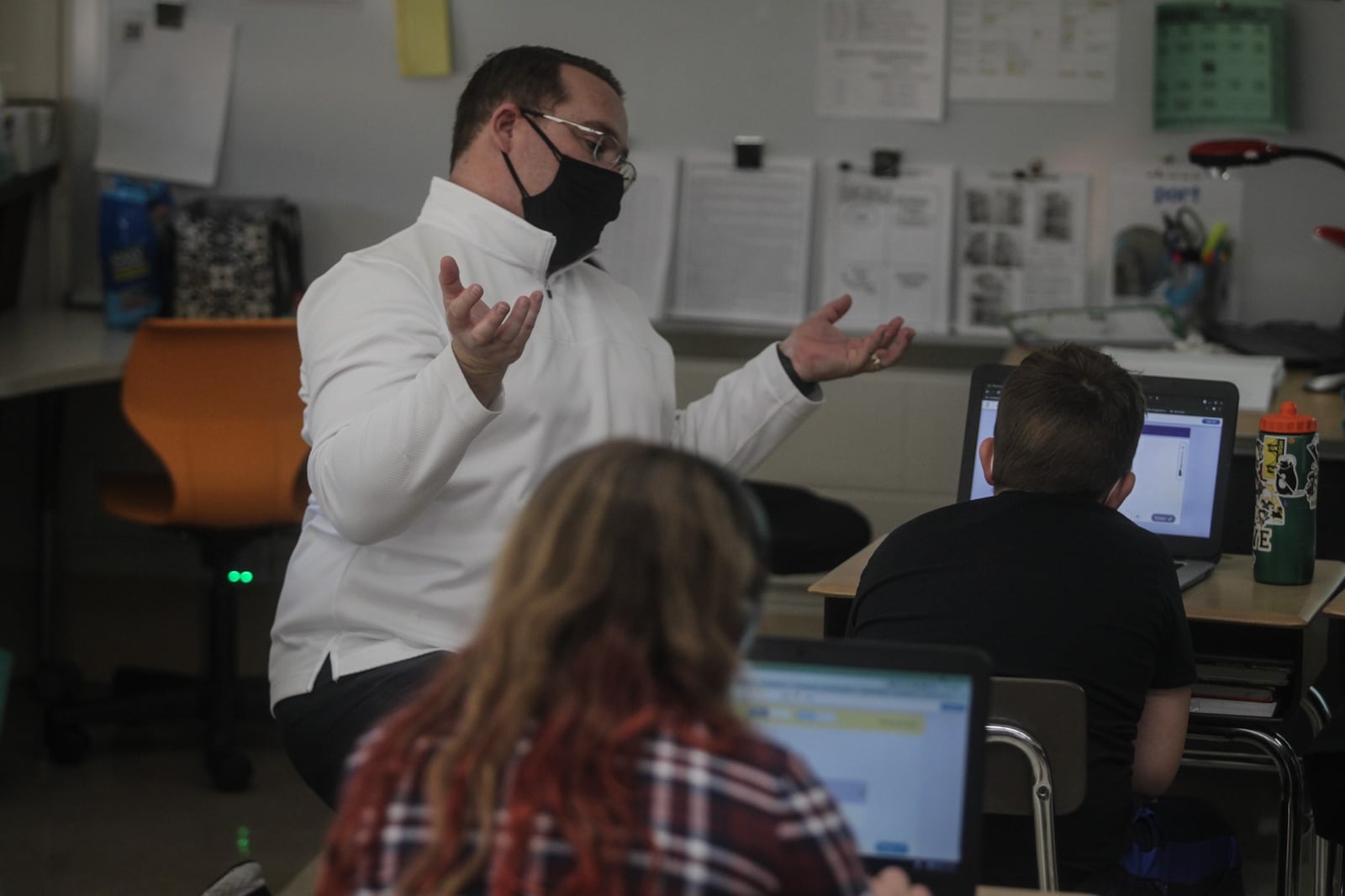 Orchard Park Elementary School math teacher, Andy Ayres talks about fractions Tuesday March 2, 2021. The school is now open for in person learning after 12 months of COVID-19 restrictions.