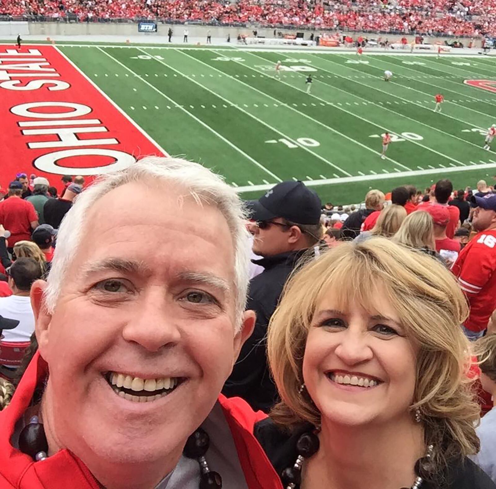 Steve Geib, founder of Agape for Youth and his wife Sandie, enjoyed doing many things together, especially attending Ohio State football games whenever possible. Sandie, who was the Agape director of development and marketing, passed away due to cancer in February at the age of 56. CONTRIBUTED PHOTO